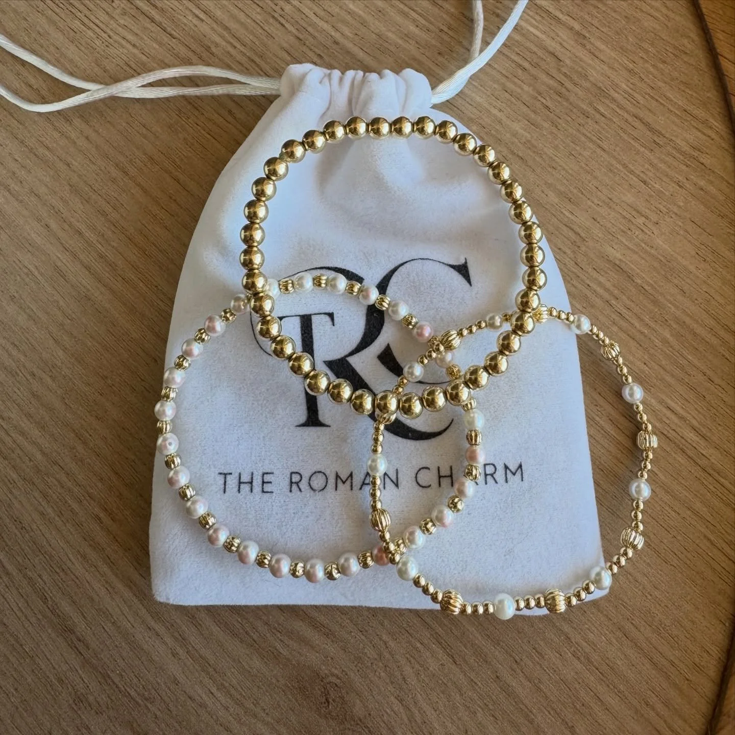 Timeless pieces, designed to be worn every day ✨

Our Roman Charm bracelets are handcrafted with intention &mdash; made to be stacked, styled, and cherished for years to come. From polished gold beads to delicate freshwater pearls, each piece tells i