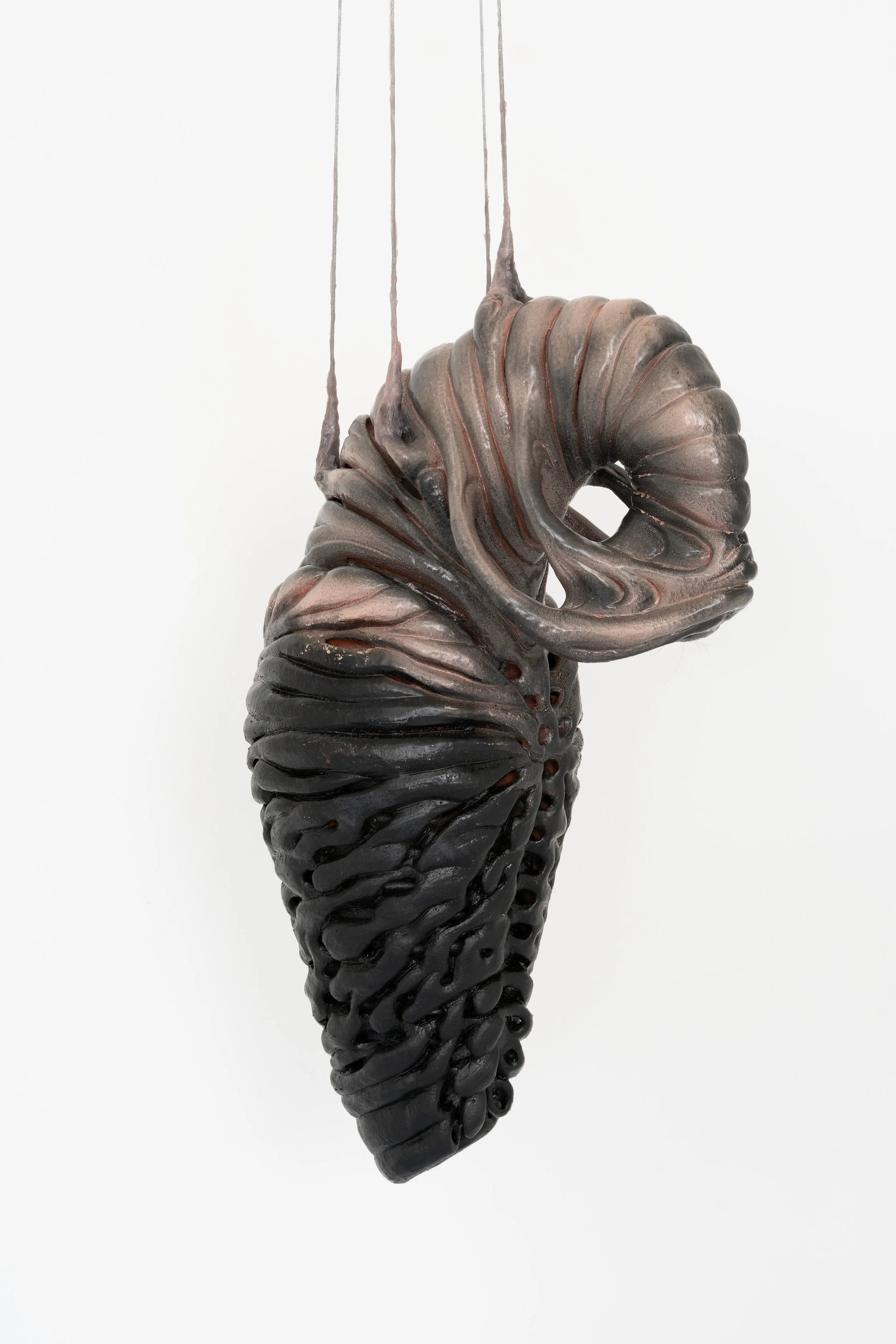 Eva Tellier,  Untitled , 2025. Ceramic, rubber, silicone, human hair. Dimensions variable.
