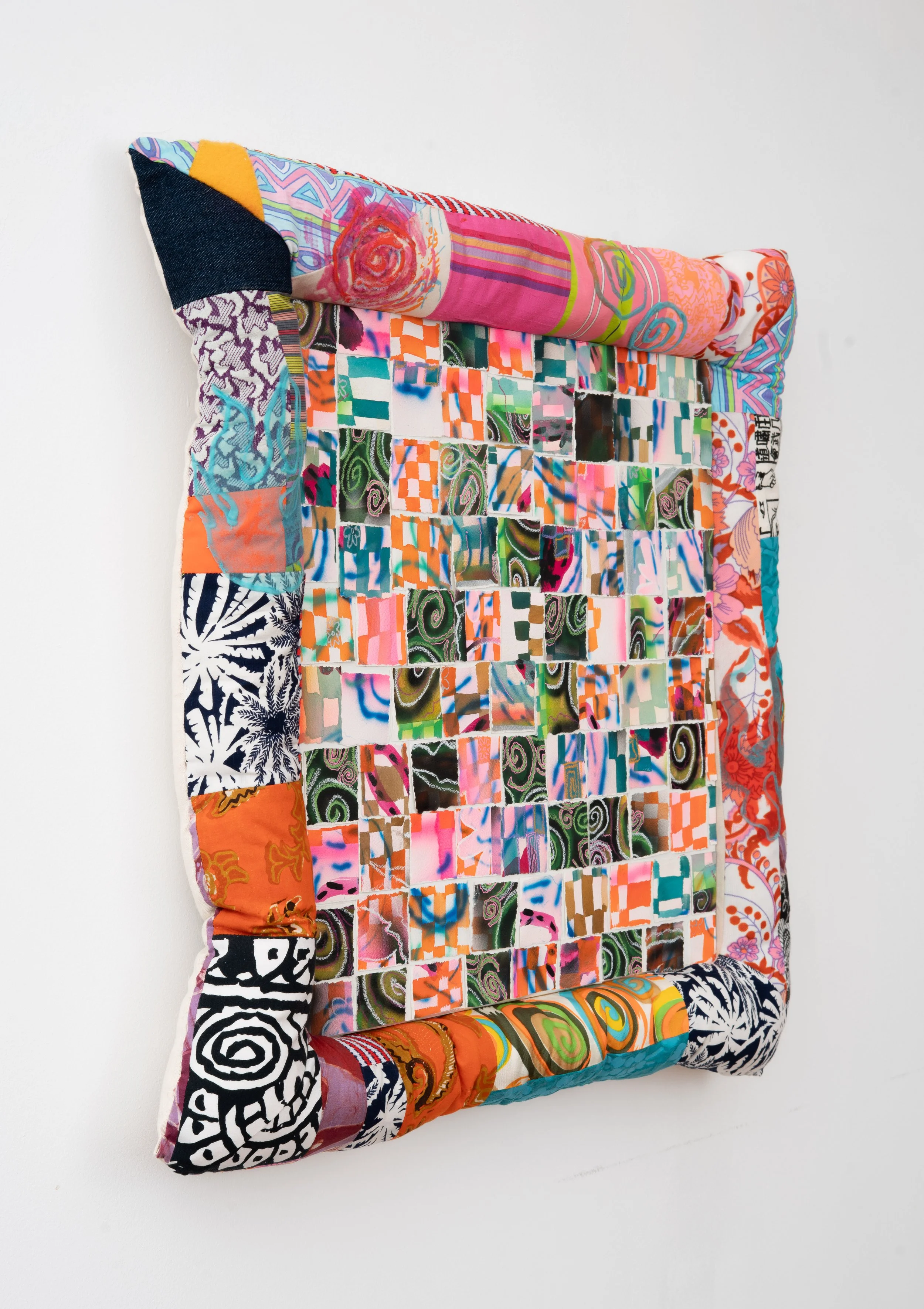 Simone Siegel,   DEALINGWITHTHEIDLE  , 2025. Acrylic on paper mounted on panel in upholstered textile frame, 27 x 28 x 3 1/2 in.