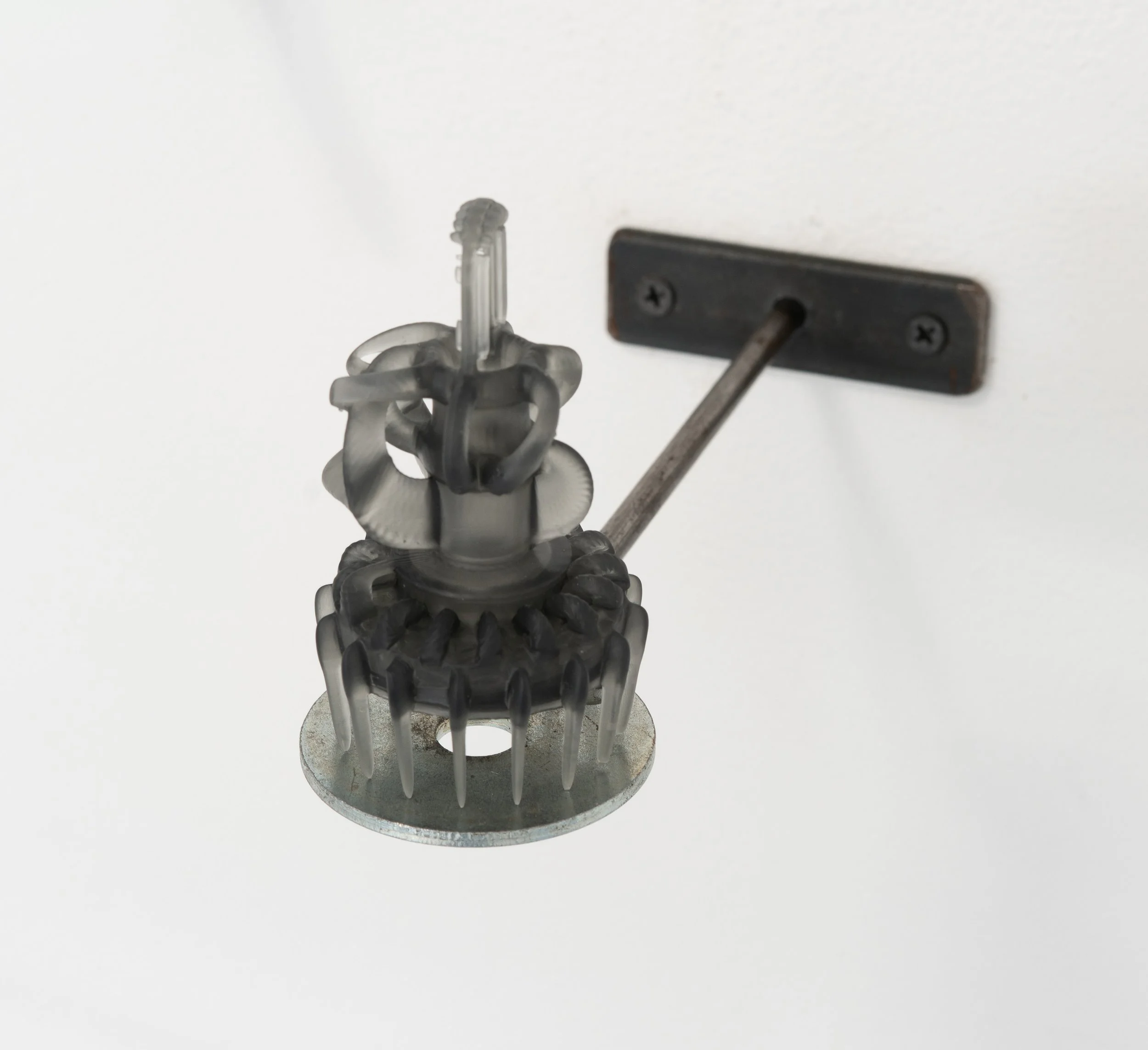 Miguel Ángel Salazar & Carlos Iván Hernández,  Arponceras , 2023. CAD rendering, 3D printed resin, custom metal holders, 3 x 4 x 4 in.
