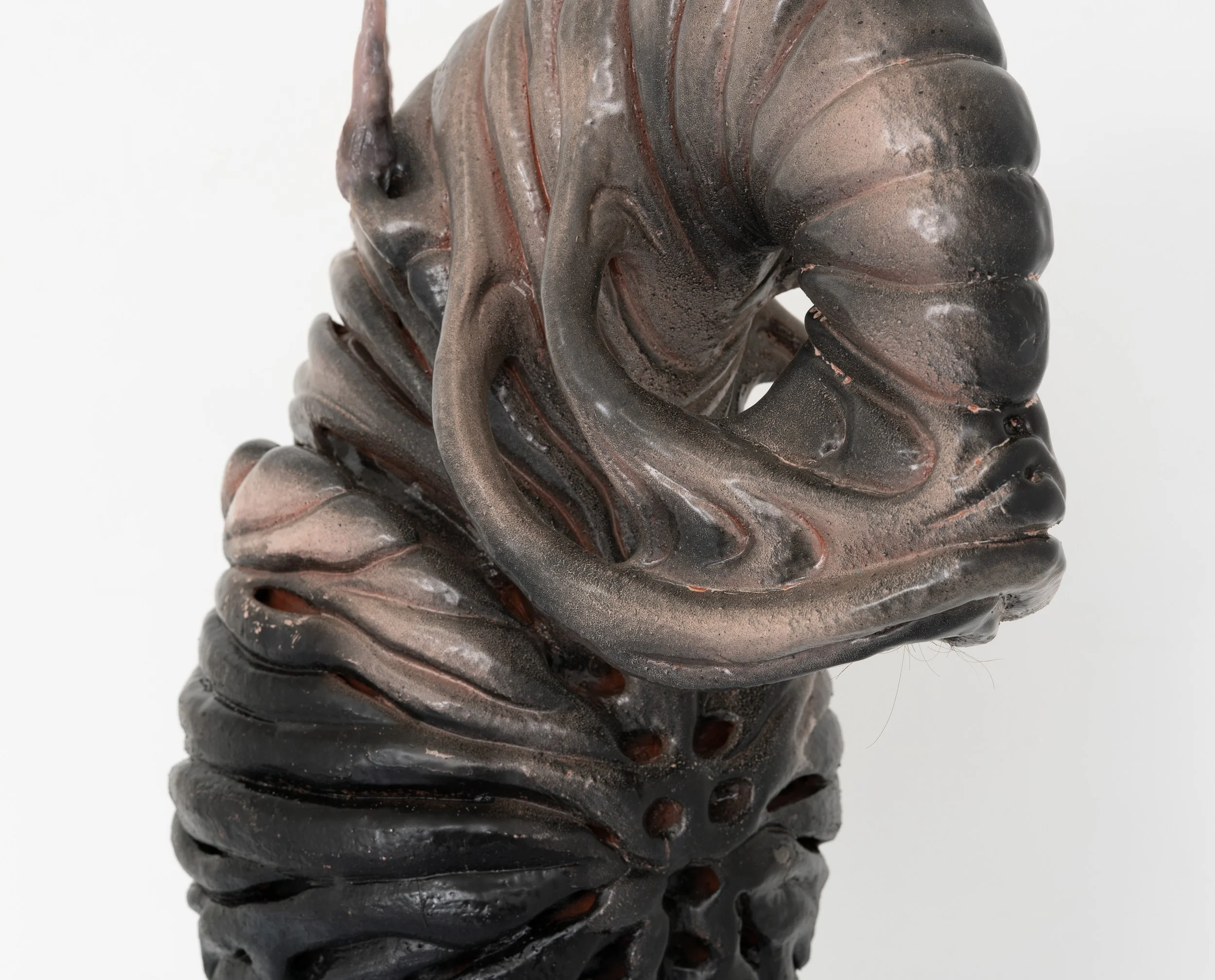 Eva Tellier,  Untitled , 2025 (detail). Ceramic, rubber, silicone, human hair. Dimensions variable.