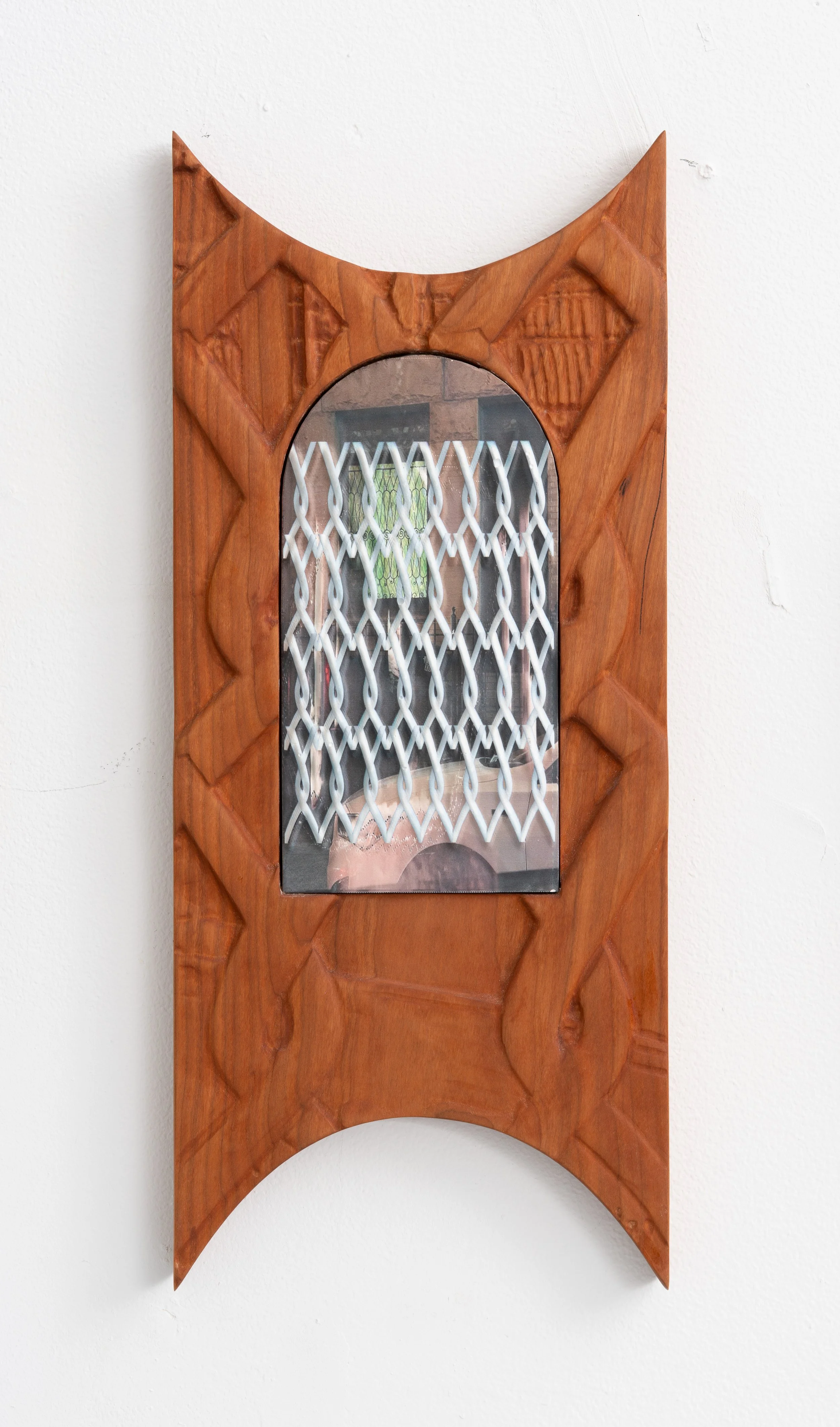 Neal Cashman,  Shark Egg , 2025. Cast Plaster, UV print, Cherry Frame. 18 1/2 x 8 in.