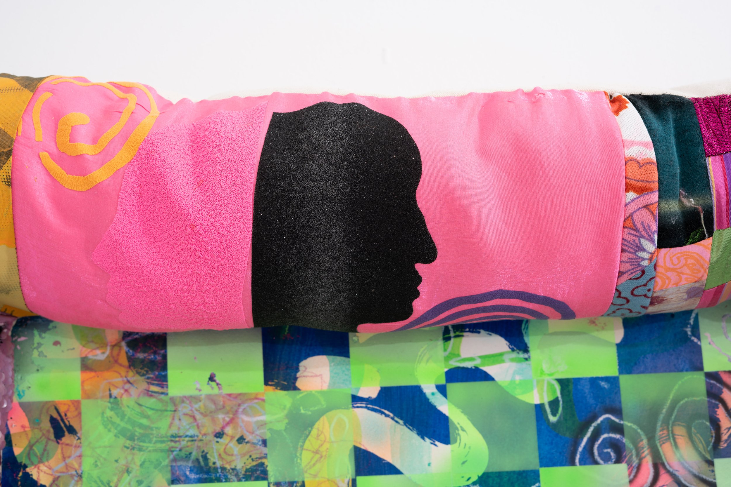 Simone Siegel,  I ROB BANKS  (detail), 2025. Acrylic on paper mounted on panel in upholstered textile frame, 38 x 35 x 5 1/2 in.