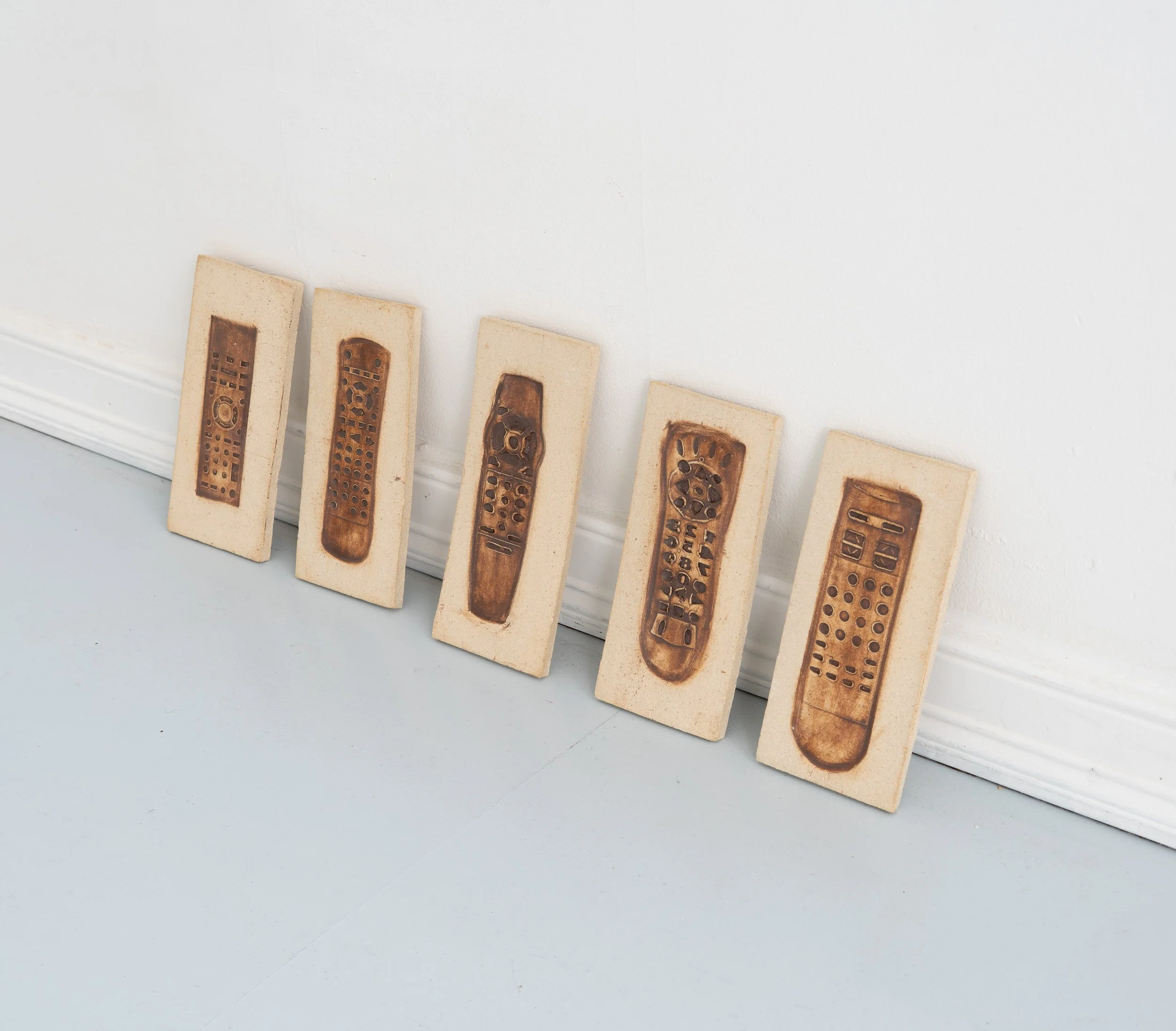 Jared Goldfischer,  Remote Fossils , 2026. White stoneware and glaze, dimensions variable.