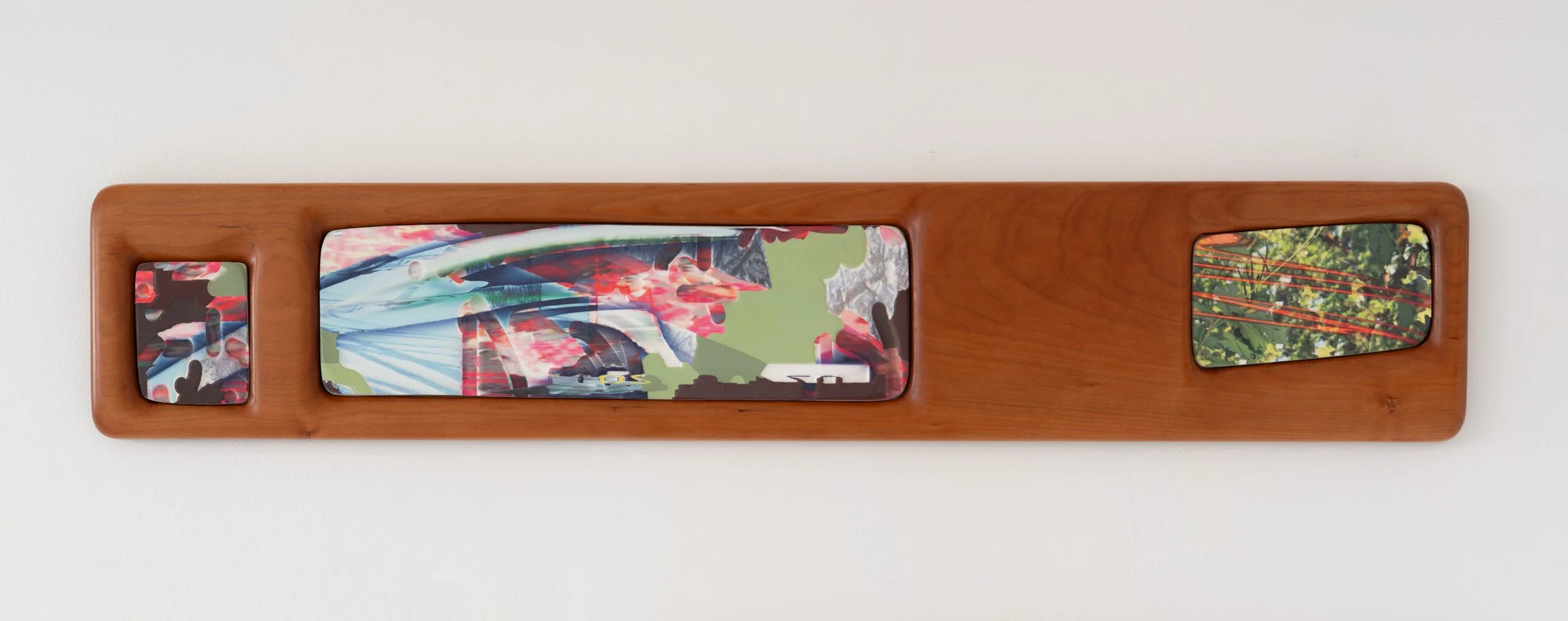 Neal Cashman,  Negative Four , 2026. Cast Plaster, UV print, Cherry Frame, 7 x 39 x 1 1/4 in.