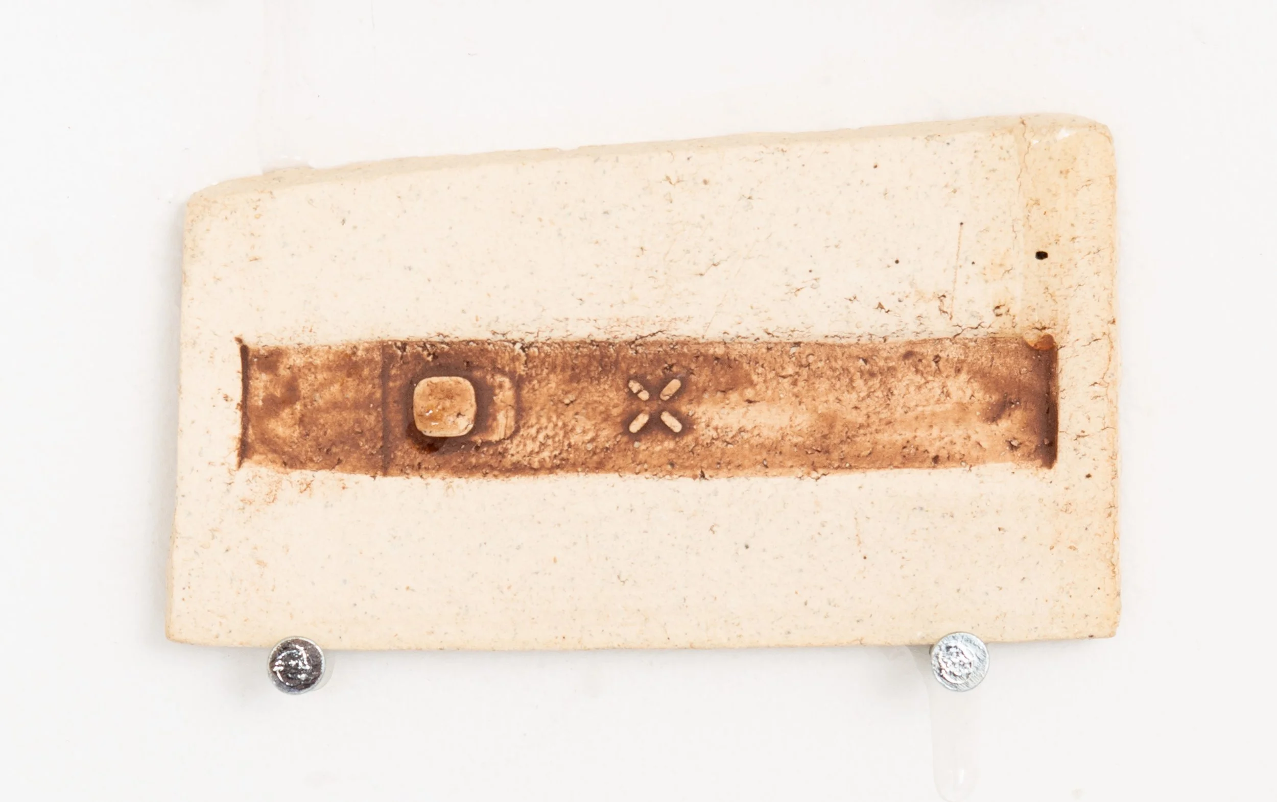 Jared Goldfischer,  Vape Fossil , 2026. White stoneware and glaze, 2 1/2 x 4 1/2 in.