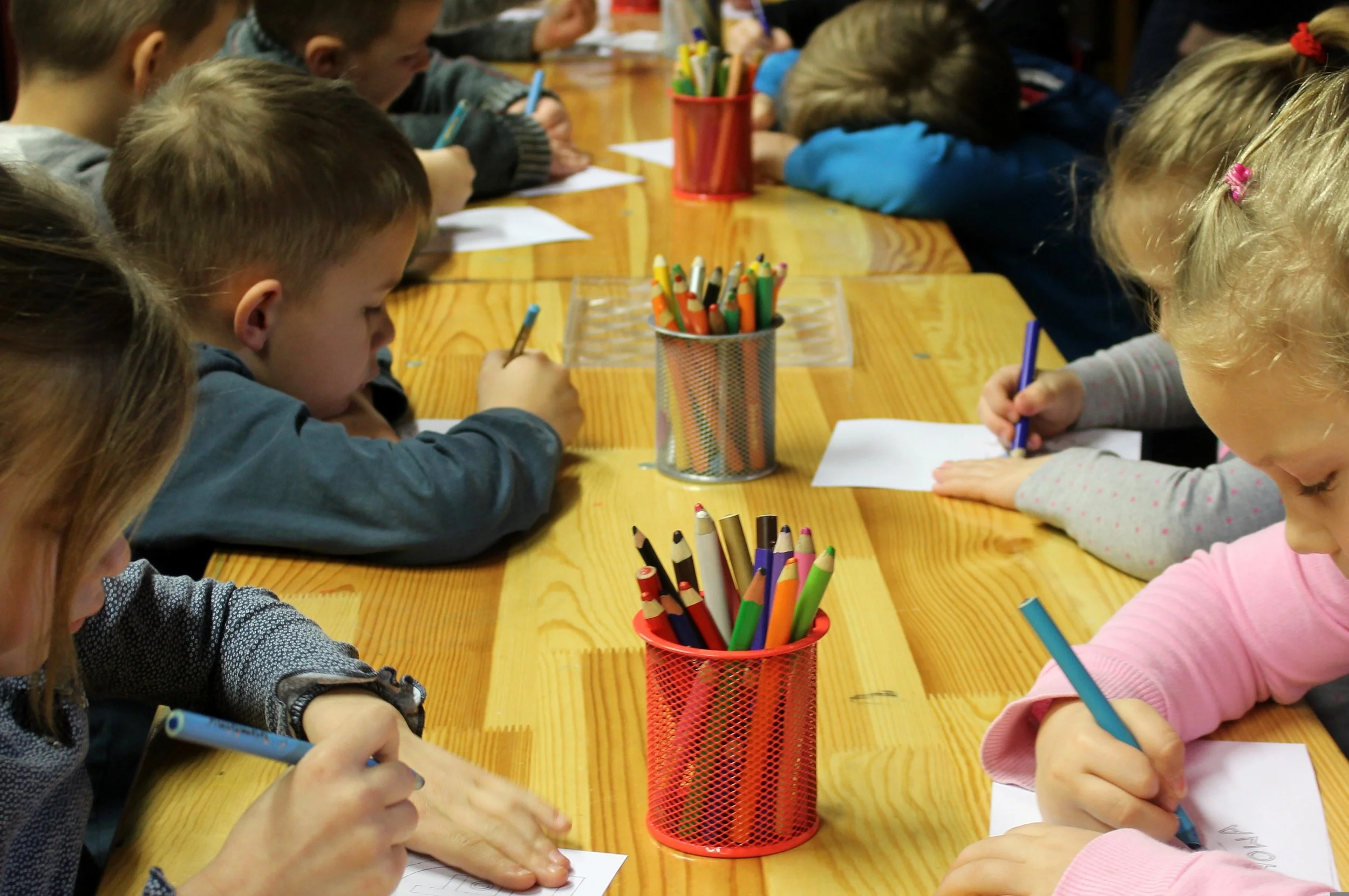 Third culture kids from different cultural backgrounds playing together at an international school