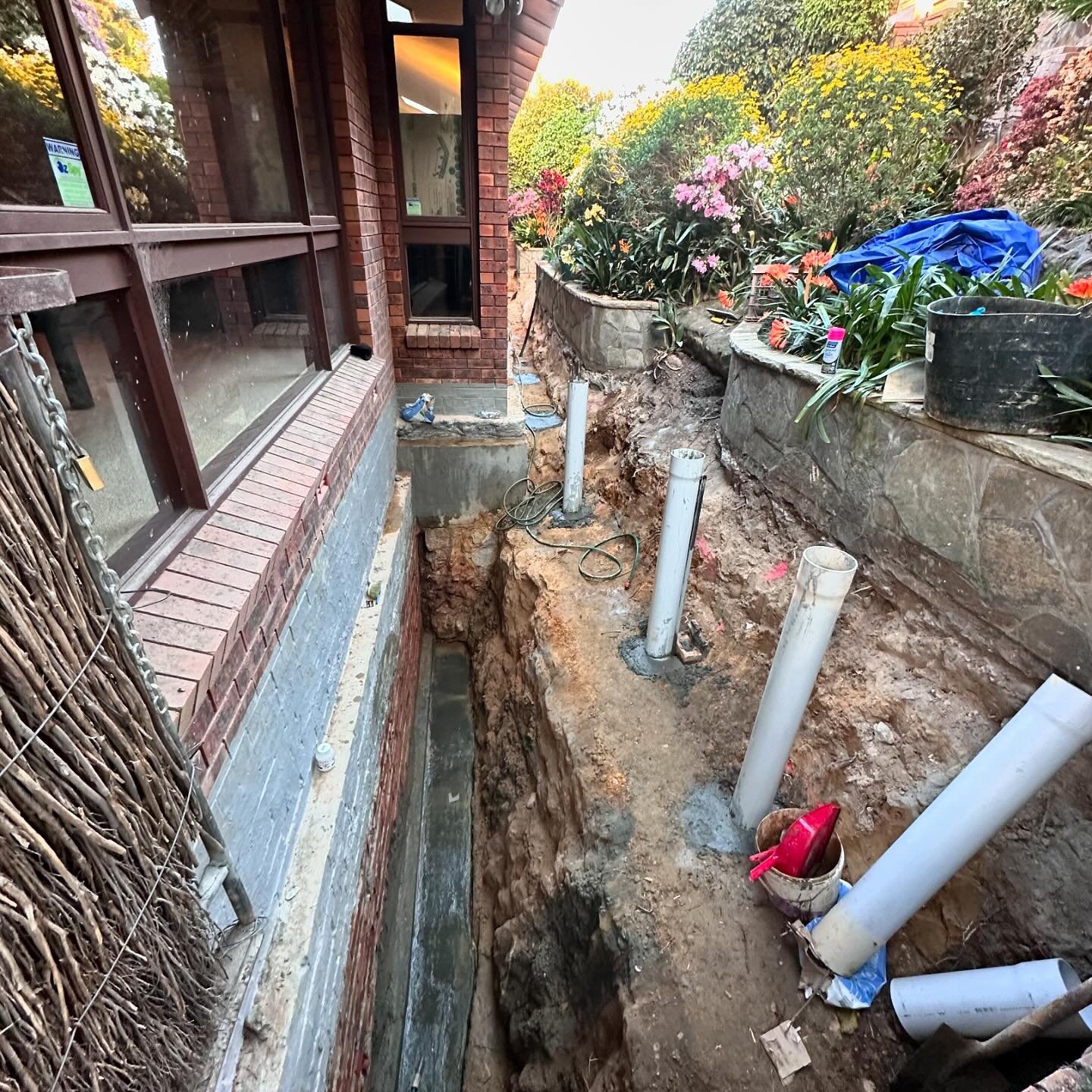 Our Kareela dig up is finally complete, resolving water issues  throughout the house.  Massive effort from the team removing 40m3 of spoil 🤯.