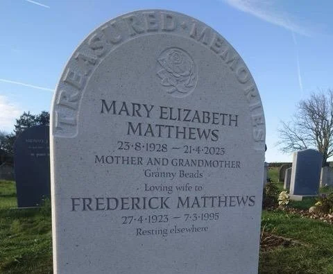 White Nabresina headstone engraved with a message honouring loved one.
