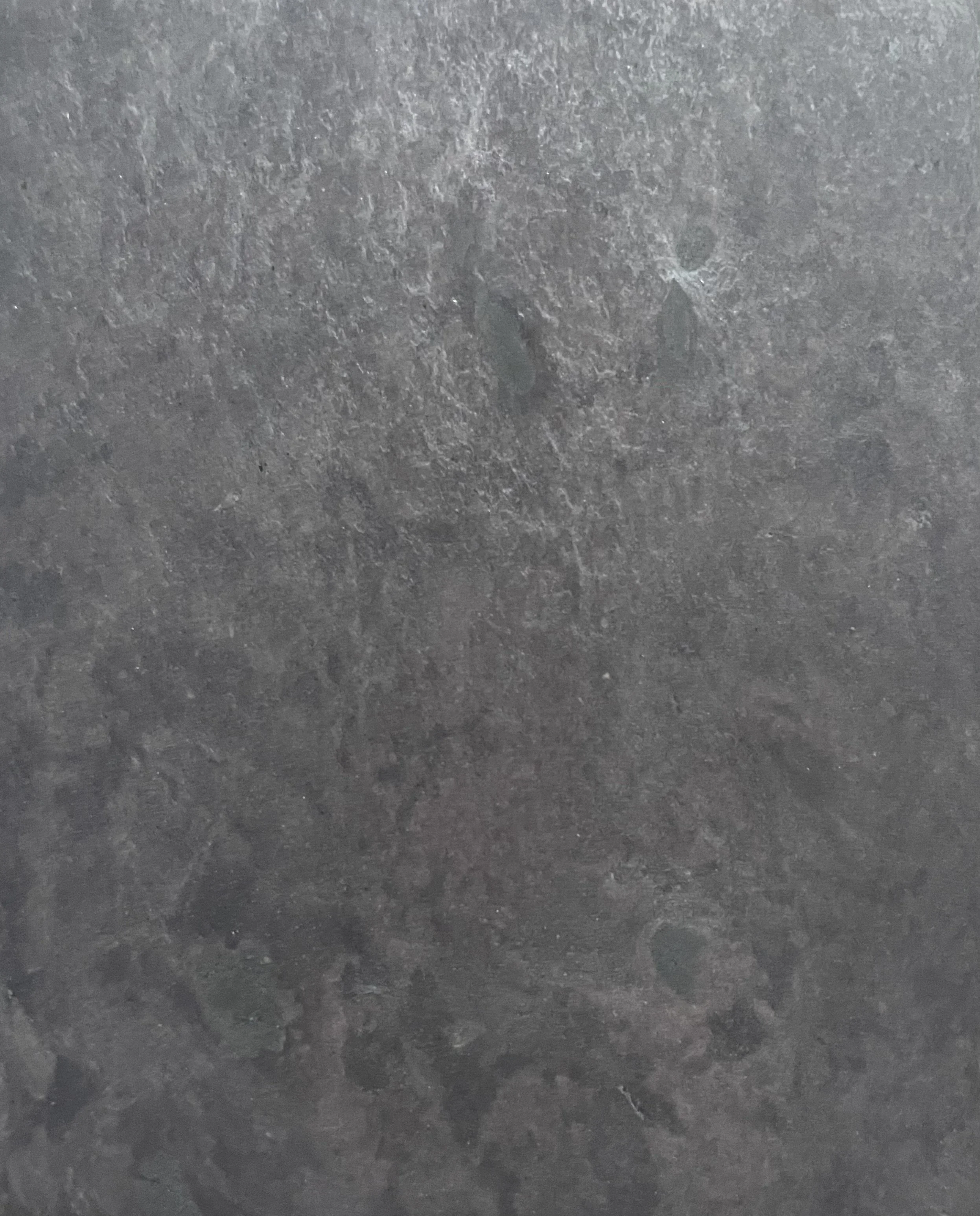 A close up photo of Valentia Slate Memorial, a light grey with a soft heather undertone.