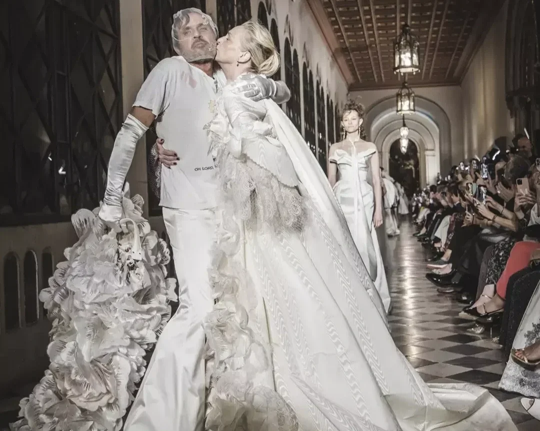 Andreas Kronthaler and Simonetta Gianfelici with the 'Violette' Veil, at Vivienne Westwood for Barcelona Bridal Fashion Week.