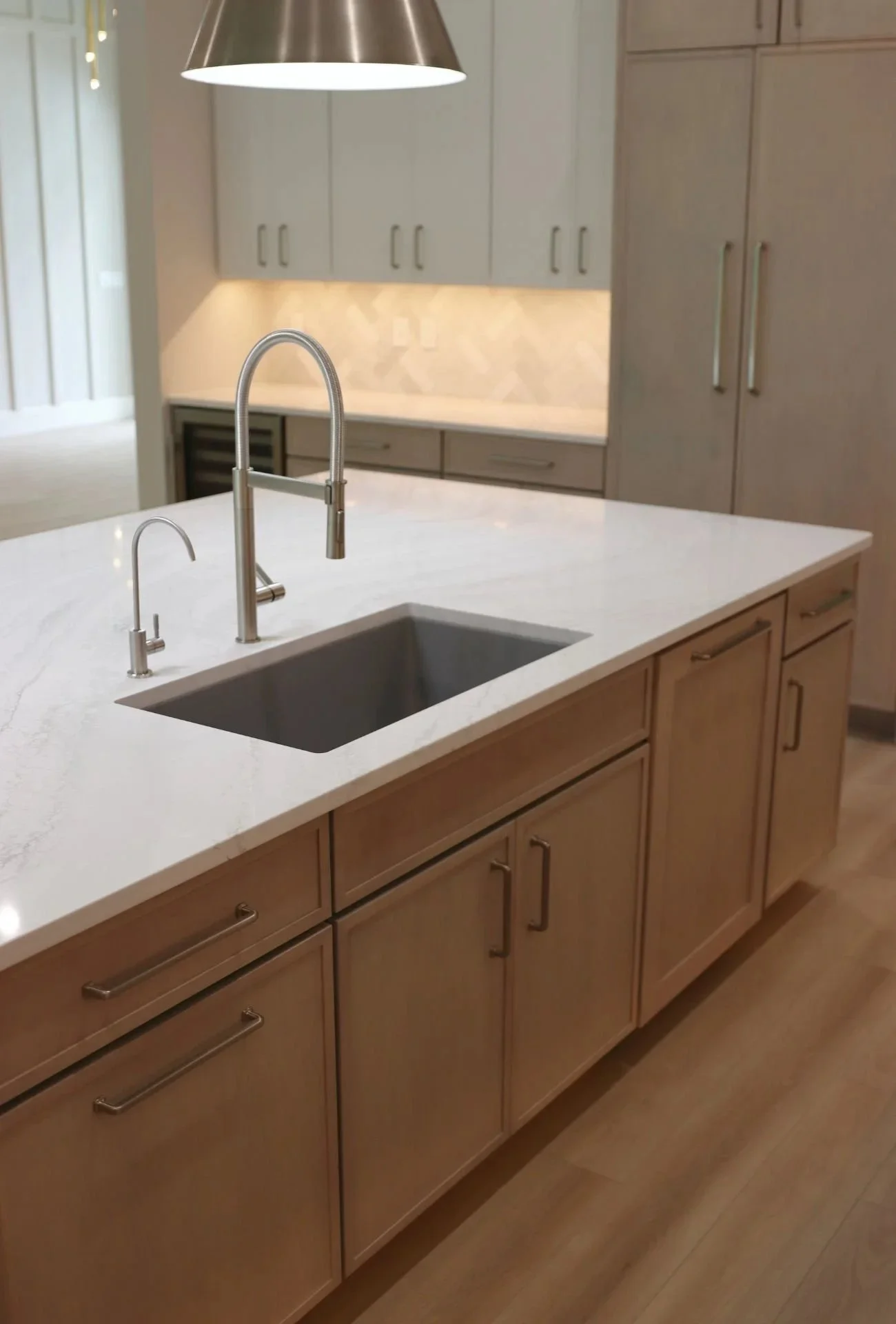 Kitchen with light wood cabinets and quartz countertop Jacksonville FL.jpg