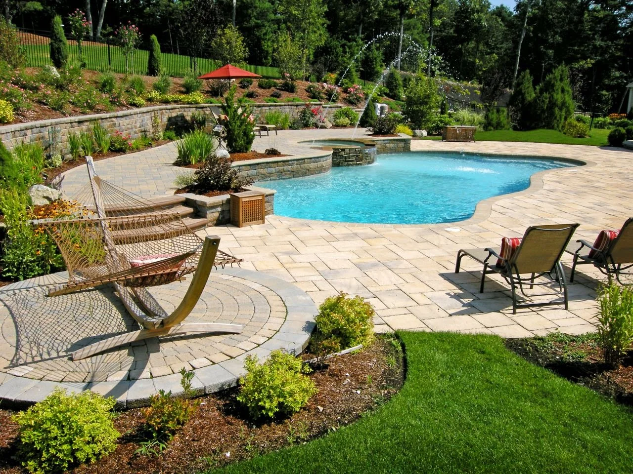 Augusta, GA Fire Pit Fireplace Outdoor Kitchen custom installation with pavers patio pergola pool deck