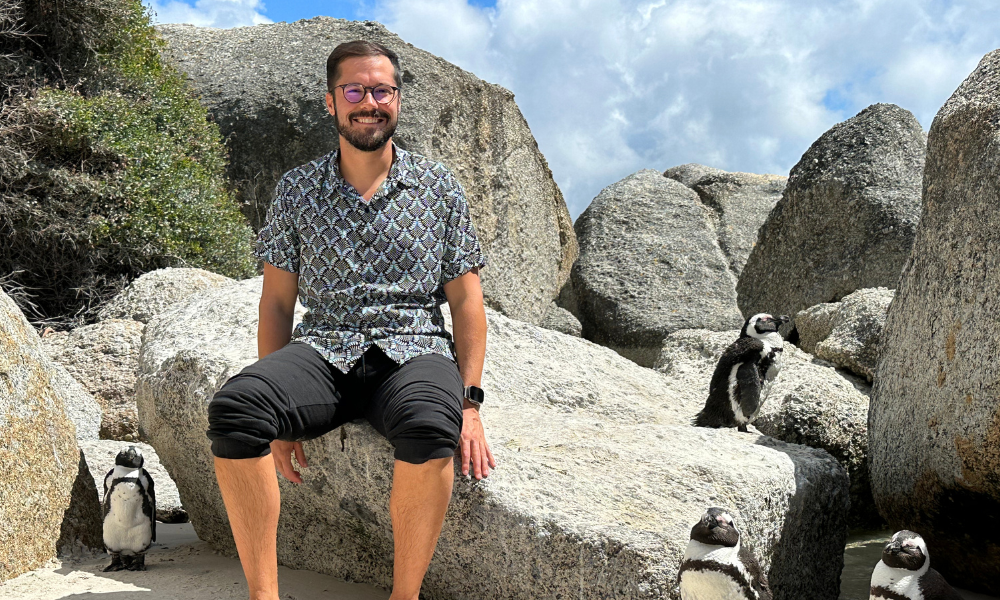 Ryan with penguins in Cape Town