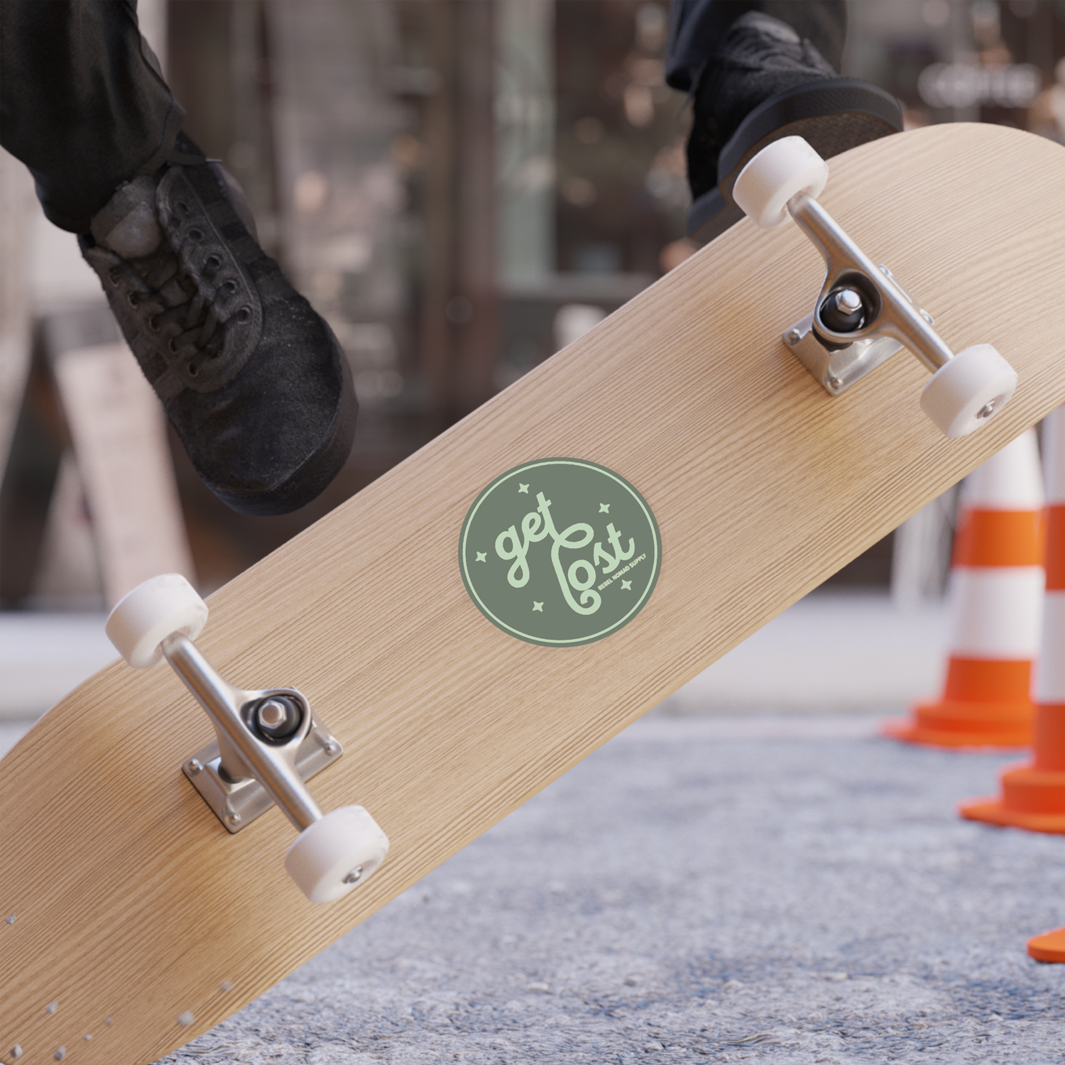 Get-Lost-Sticker-On-Skateboard.png