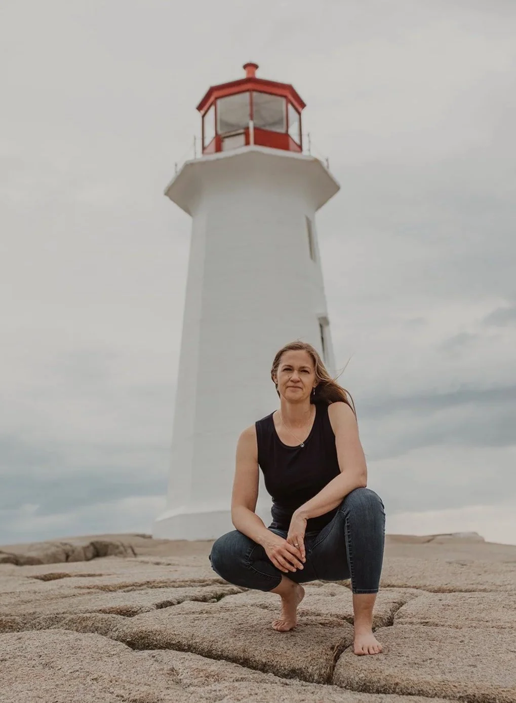 Brenda Standing by a Lighthouse
