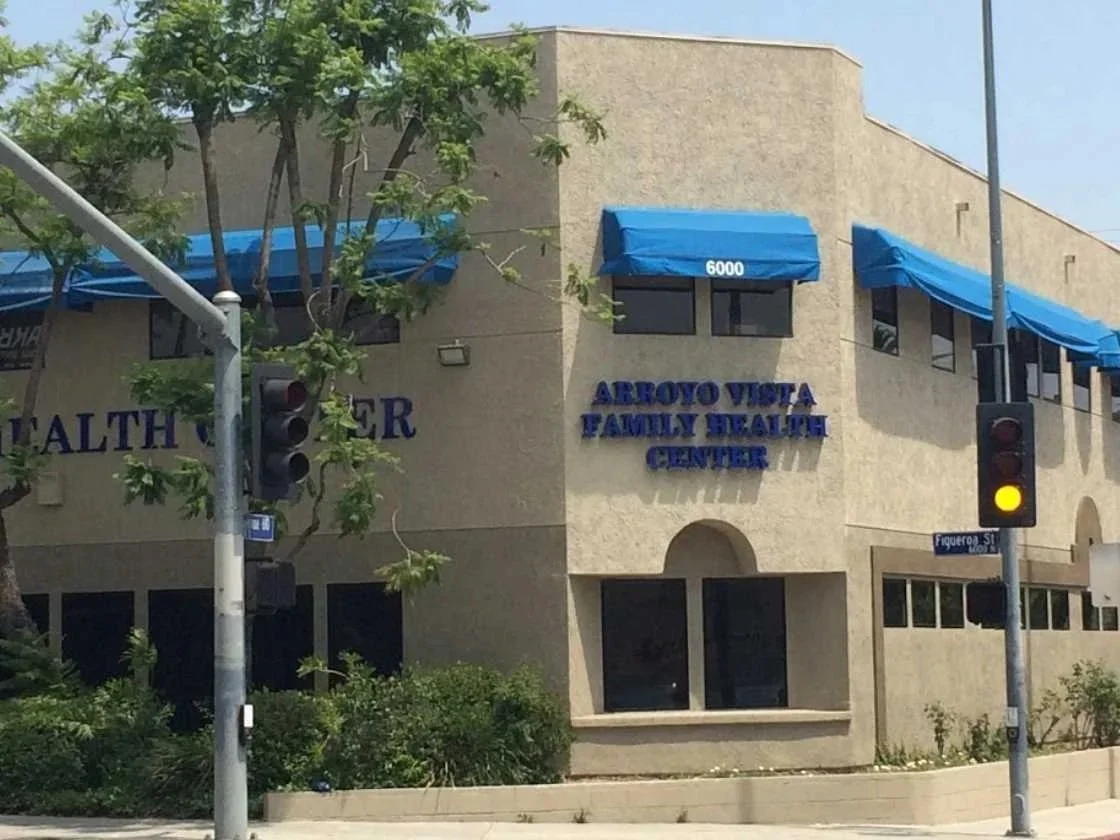 Arroyo Vista Family Health Center signage on the wall