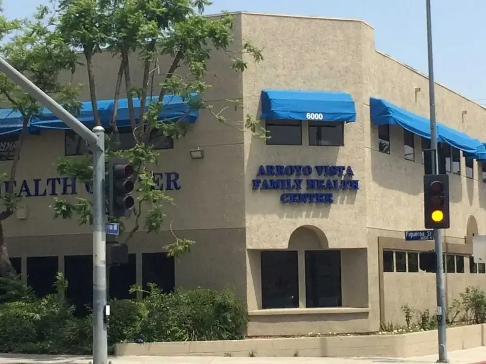 Arroyo Vista Family Health Center signage on wall