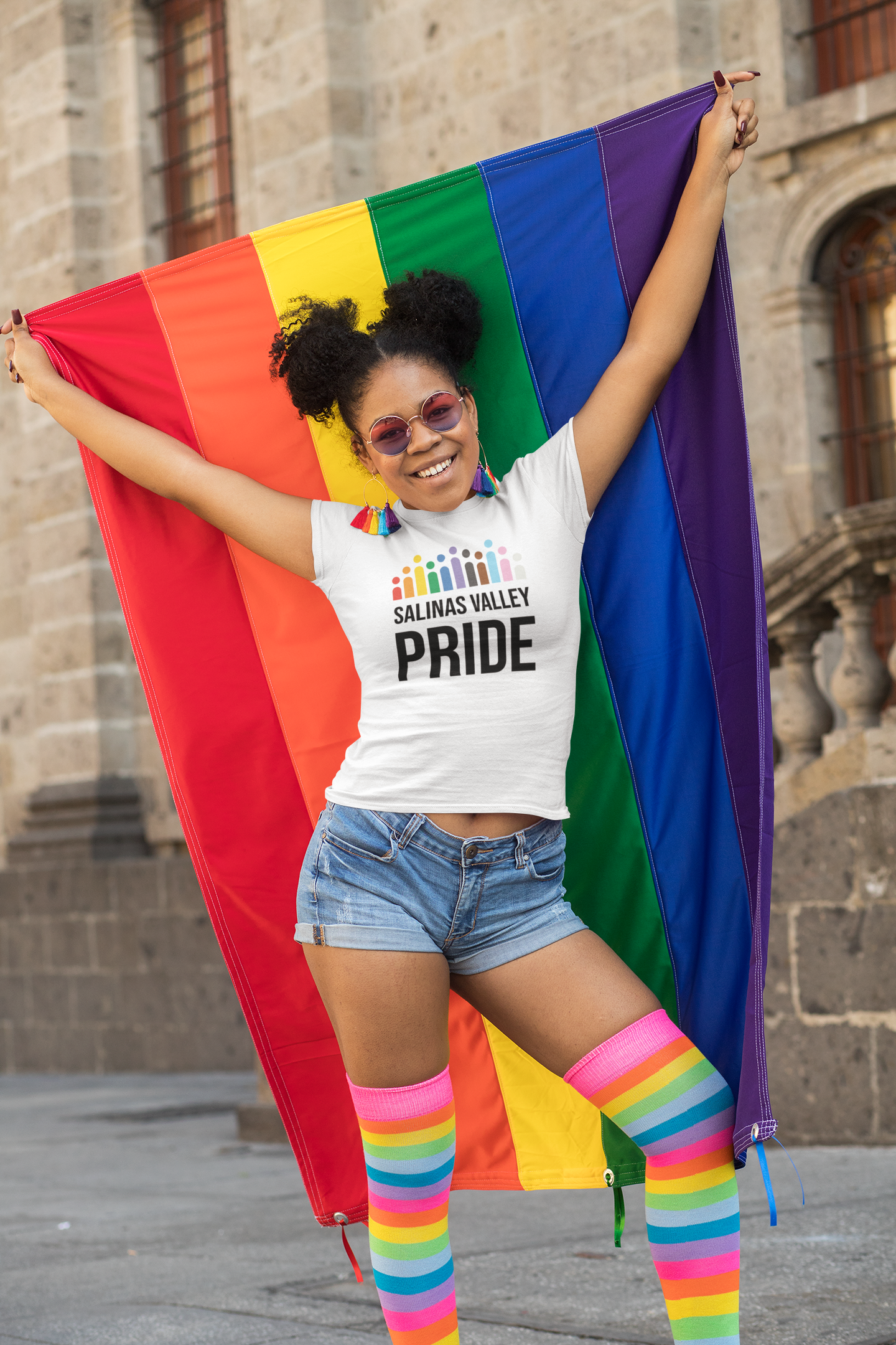 t-shirt-mockup-of-a-woman-proudly-holding-a-rainbow-flag-32985.png