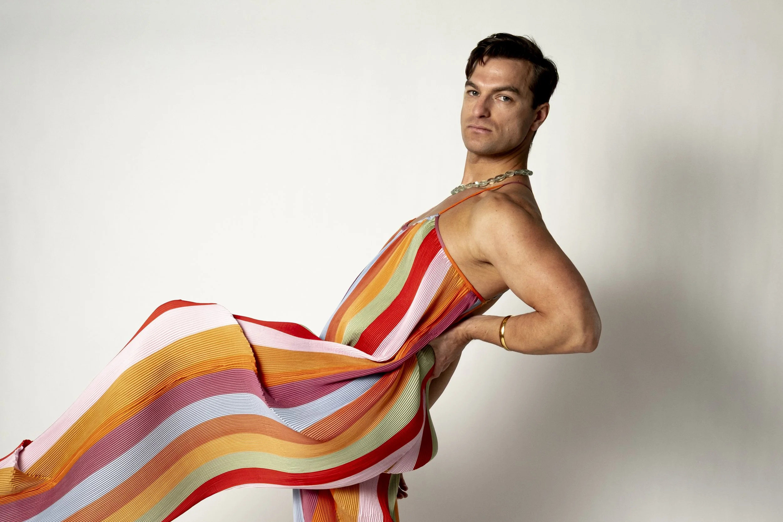 Tanner Skilton wearing a multicolor jumpsuit from Haberdashery.