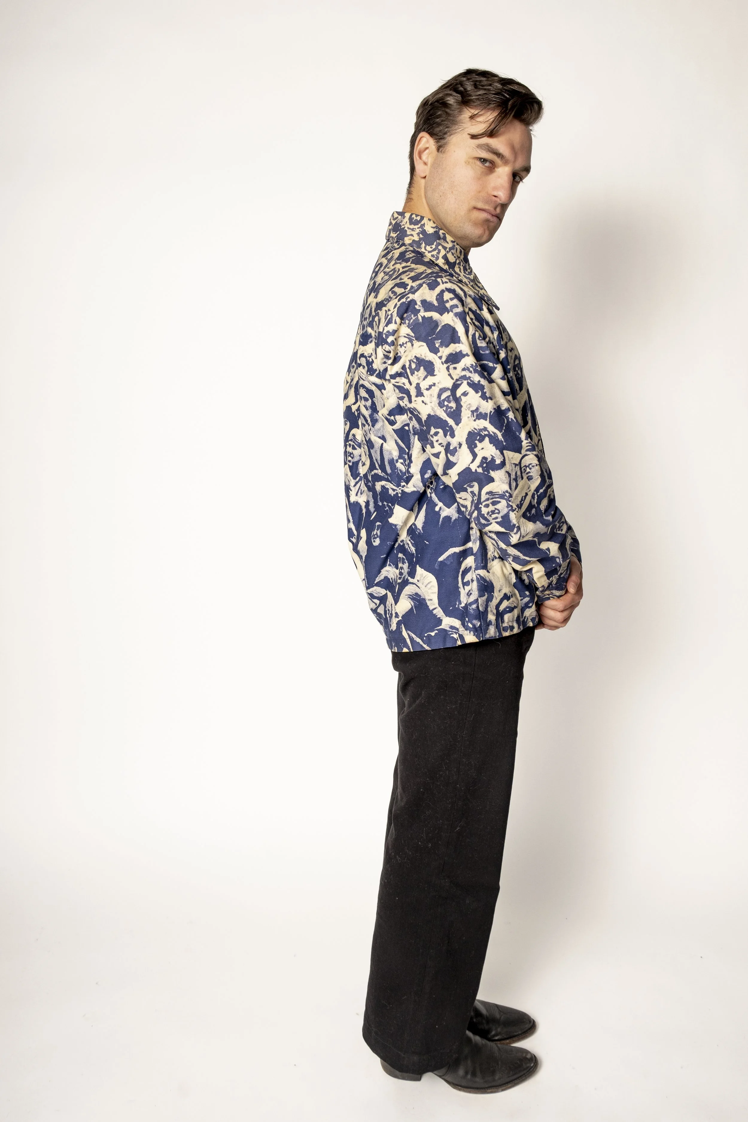 Tanner Skilton wearing a vintage Woodstock print shirt.