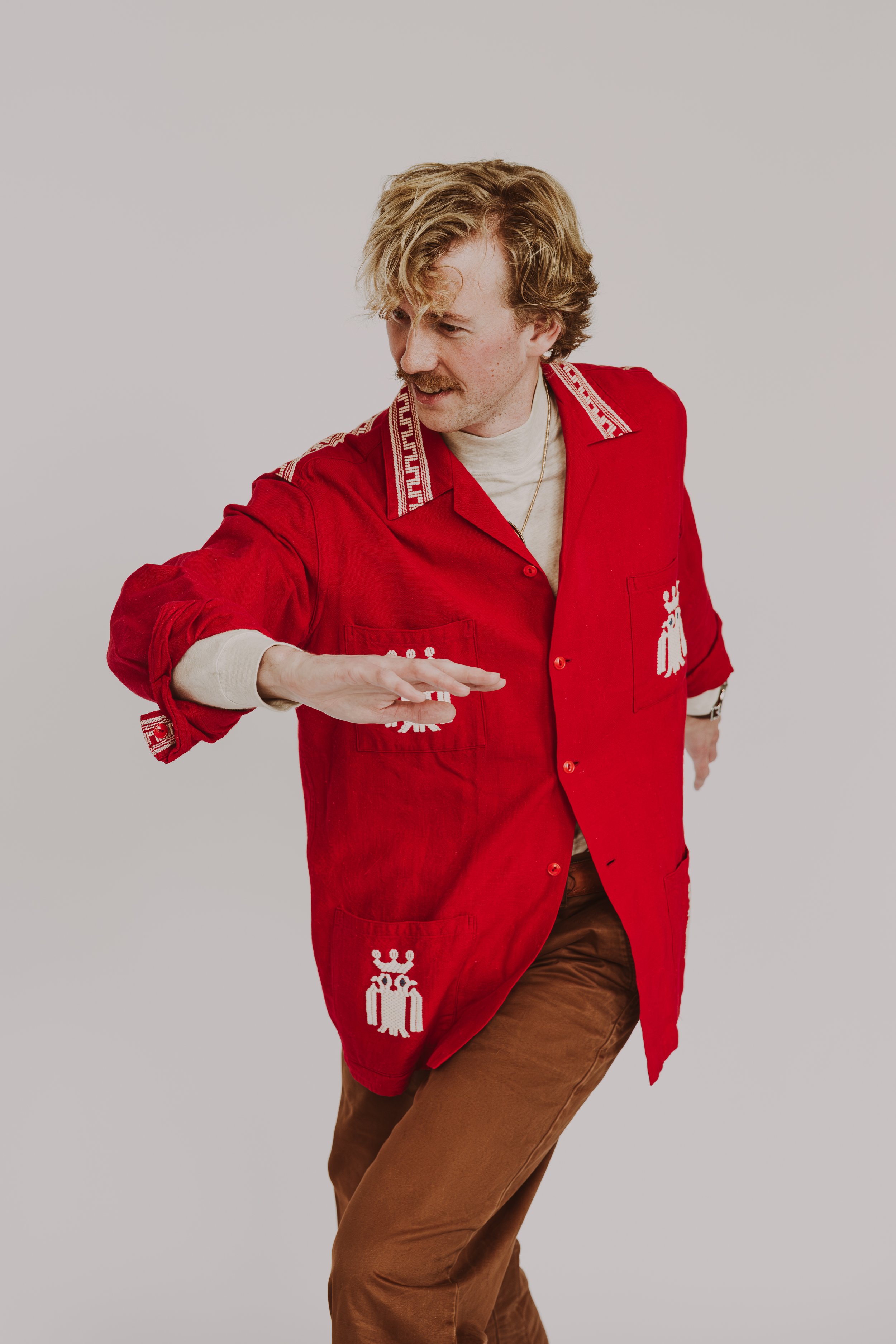 Zach St Clair poses in vintage menswear from Portland, Maine