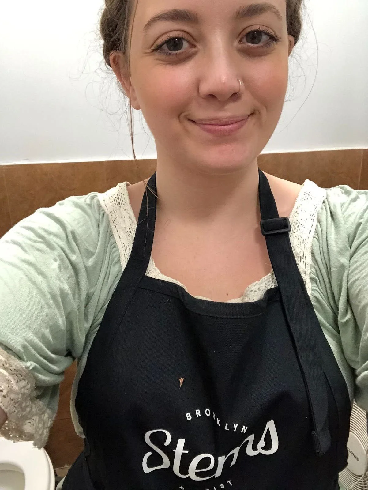Florist in apron selfie