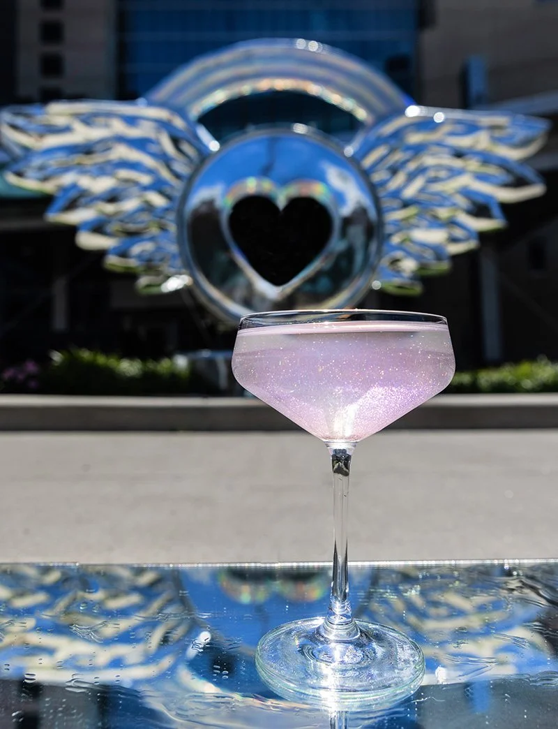 Fountain City Chrome Cocktail at Loews Hotel inspired by Trew Love’s “No Place Like Chrome” Parade of Hearts Sculpture