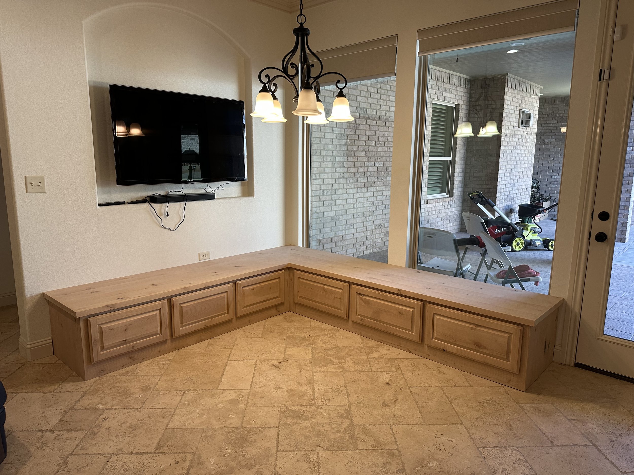 Custom L-shaped bench seats with functional drawers