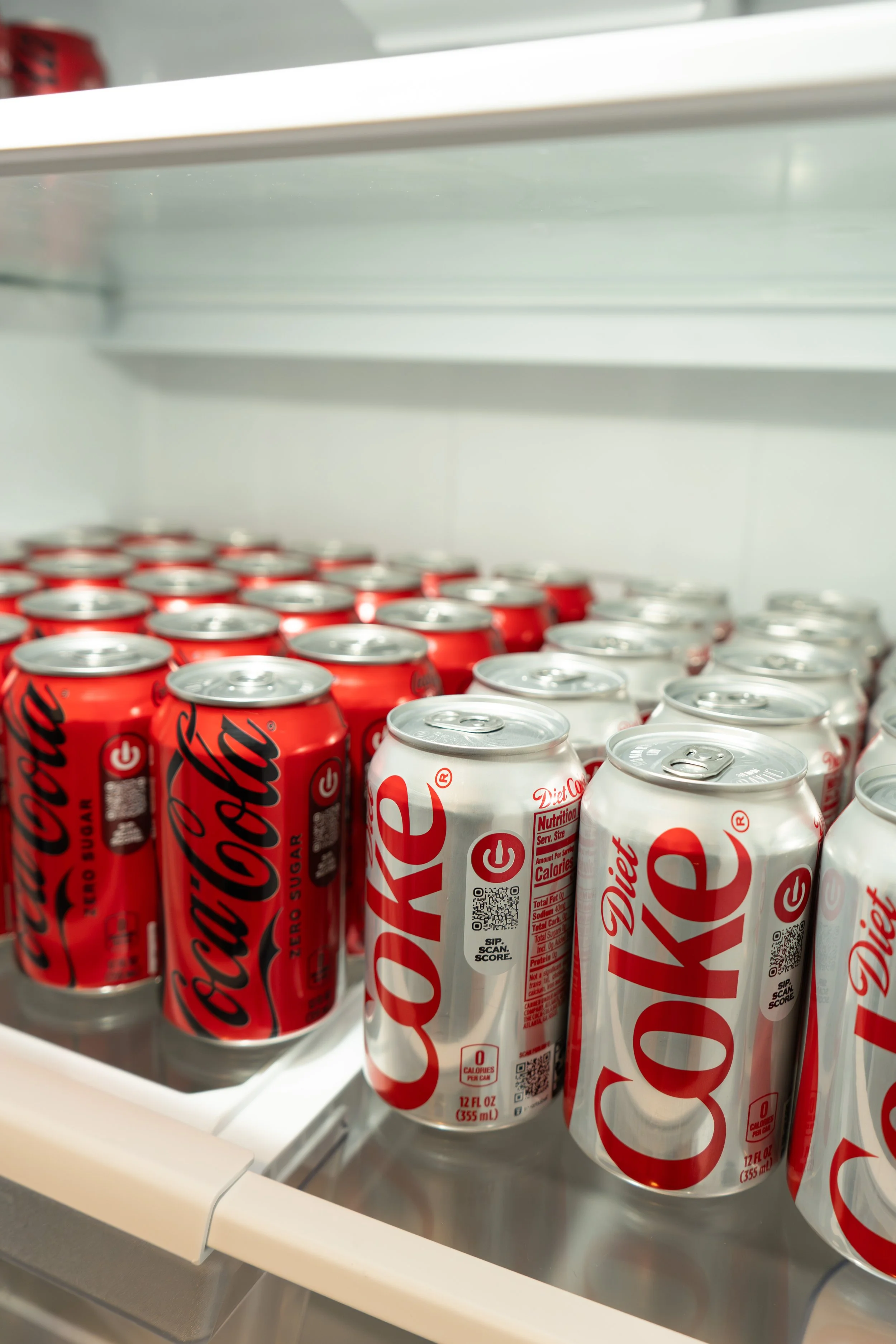 Coke and Diet Coke in fridge