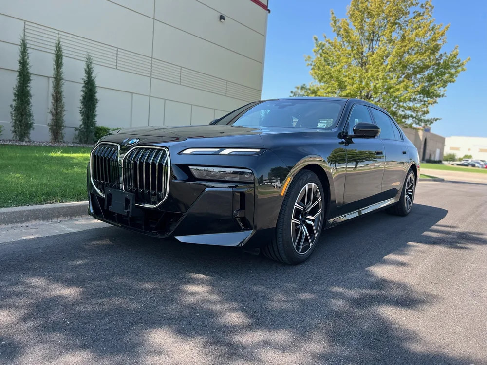 Black luxury sedan from the Premium Transportation fleet