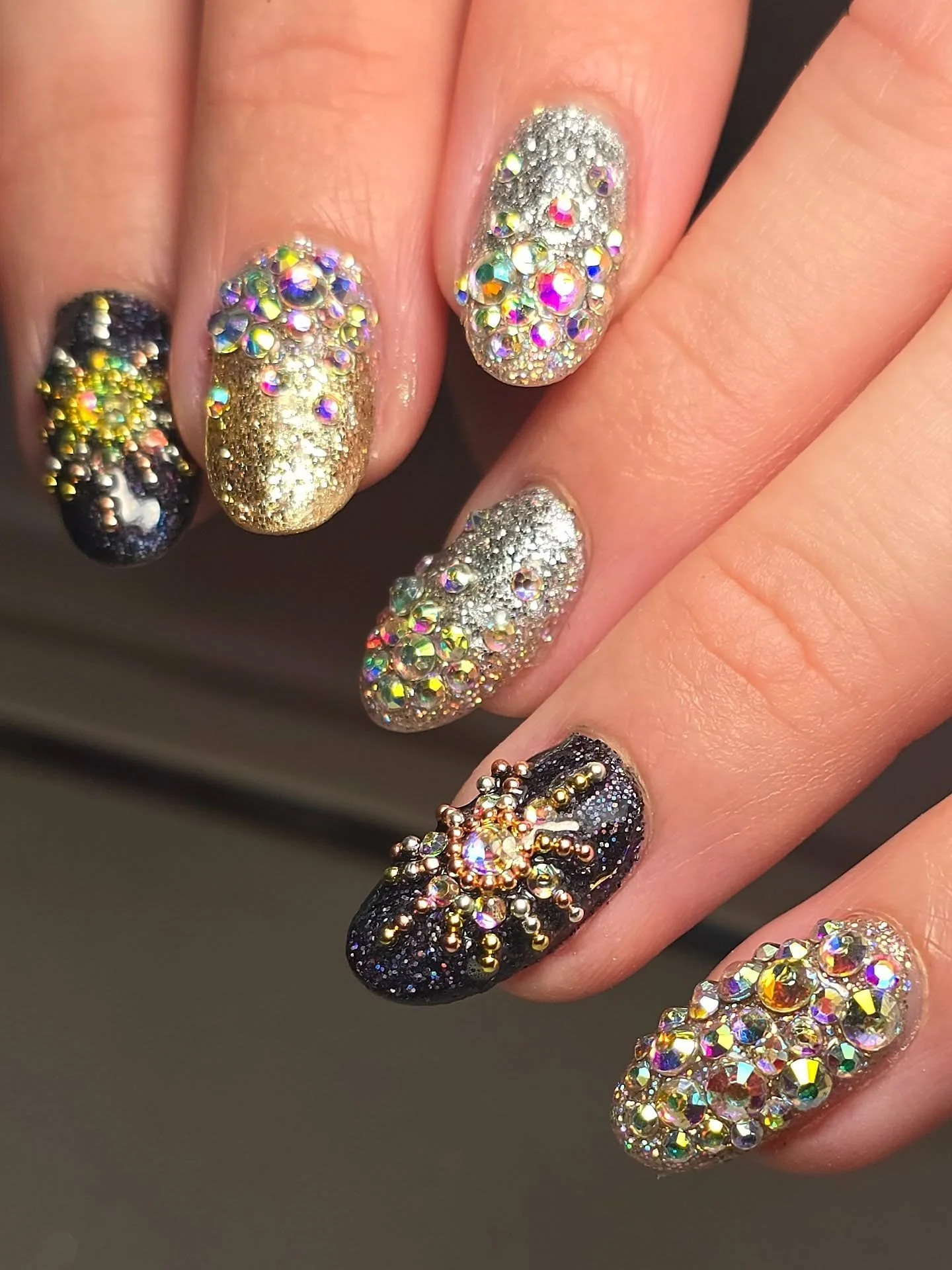 Welcoming in 2026 with the most extravagant bejeweled nails I think I have ever done! 

Between the two of us, we had a rough idea, but couldn't find any inspo pics, so chatGPT came to the rescue and gave us this fab combo of sparkles and gems and fi
