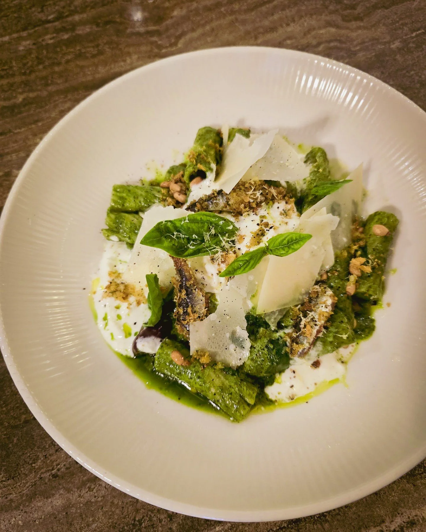 Pesto Vert &amp; Stracciatella Tortiglioni with smoked &amp; lightly panko-crumbed anchovy, topped with reggiano, basil and toasted pine nuts. ⁠
⁠
And this gorgeous pasta is available all day 🤌⁠
⁠
#sgdinner #hollandvillage #chipbeegardens #sgfoodie 