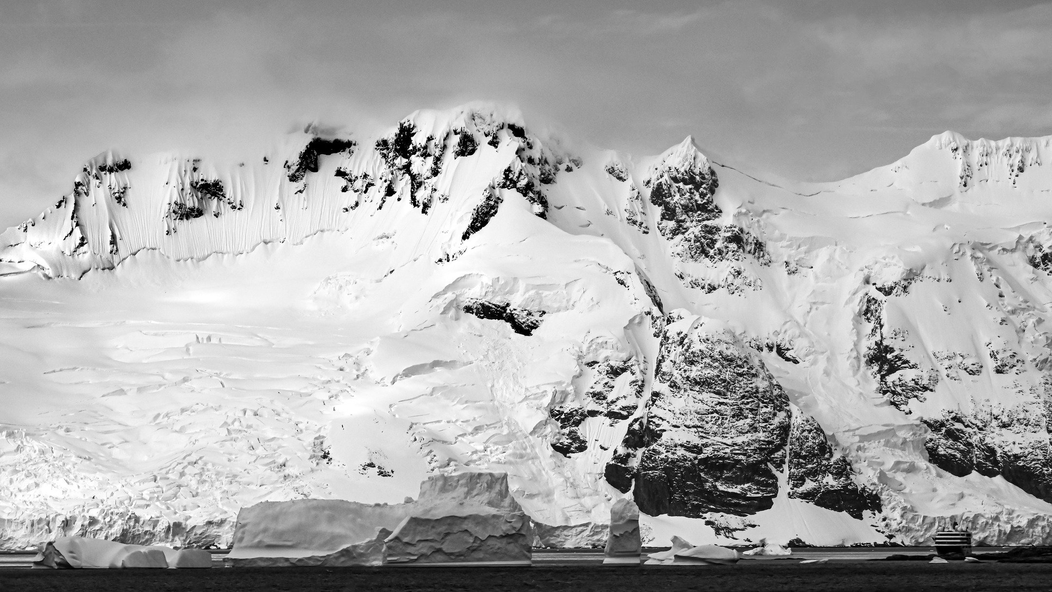 Majestic Antarctica the grandeur of the mountains and icebergs dwarfing the ship, revealing the true scale of this incredible place. I create from feelings not appearance Deep Heart Earth&reg; is the emotional imprint in all my landscapes..if you wan