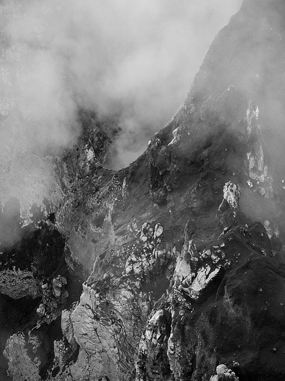 &ldquo;Scarred-Collateral&rdquo; 2026 The cost of being too close.  Deep Heart Earth&reg; 
From my series shot handheld on an active volcano rim and four days in the jungle.  #conceptualphotography #blackandwhitephotography #galleryphotography #colla