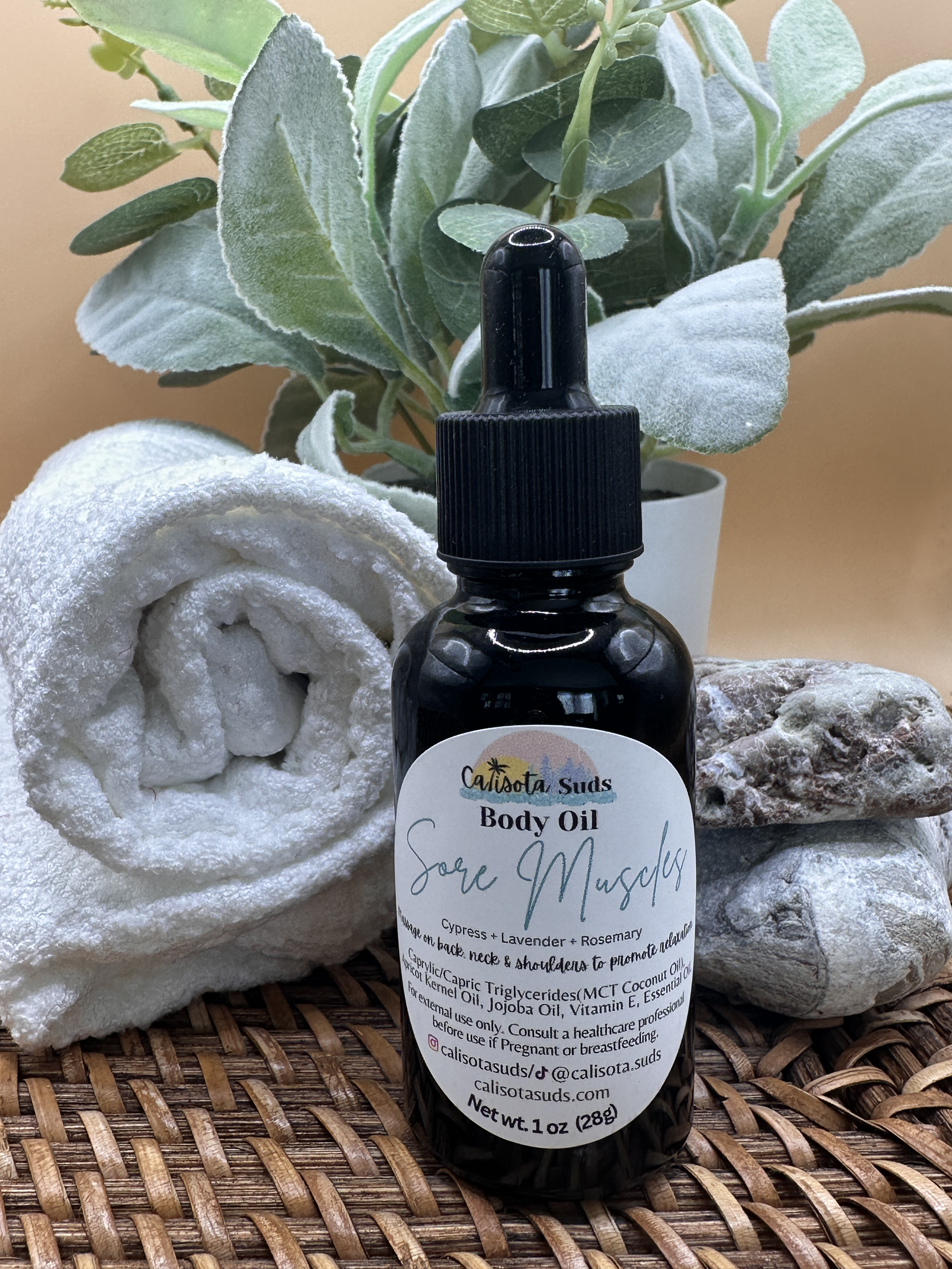 Body Oil Sore Museles baskett towel  bg.png