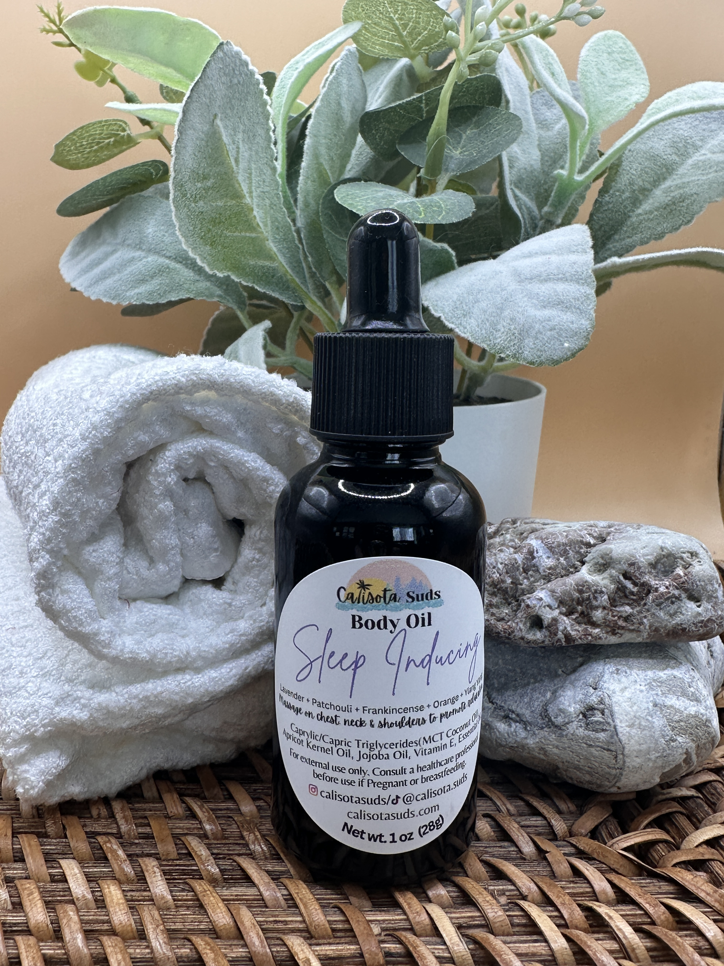 Body Oil Sleep basket towel bg.png