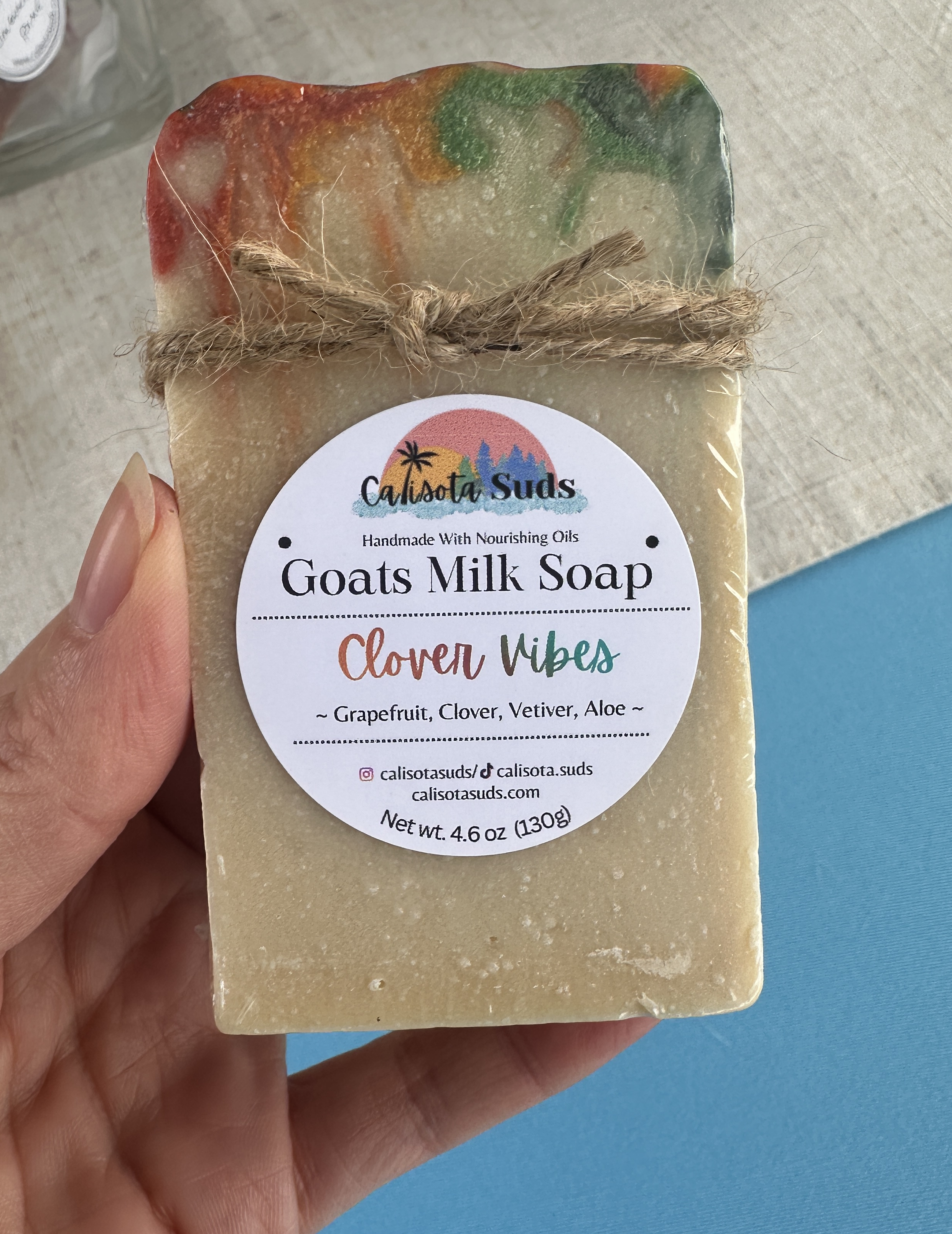 Clover Vibes holding in hand .png