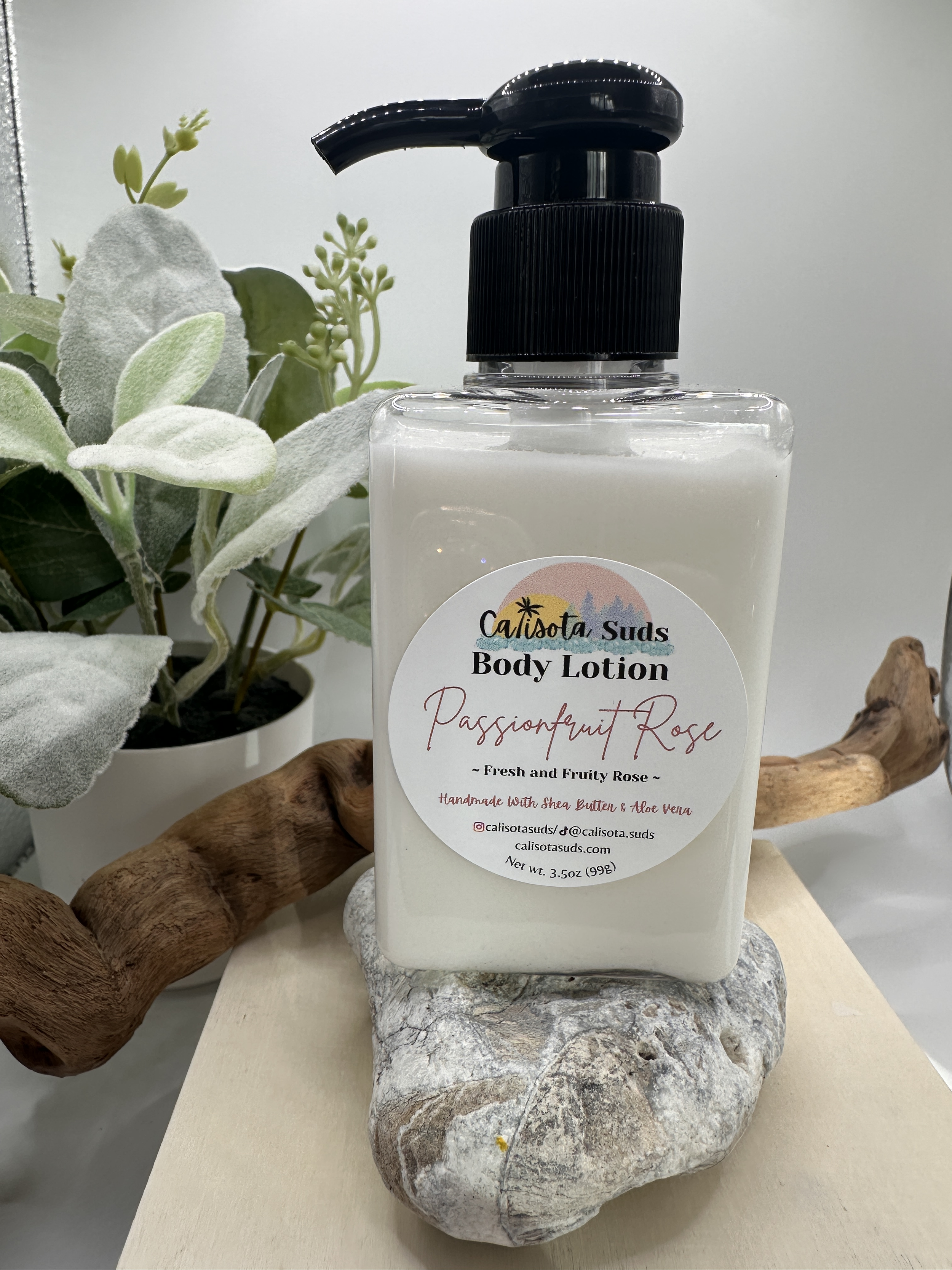 Body Lotion Passionfruit Rose wht tile and wood bin Bg.png