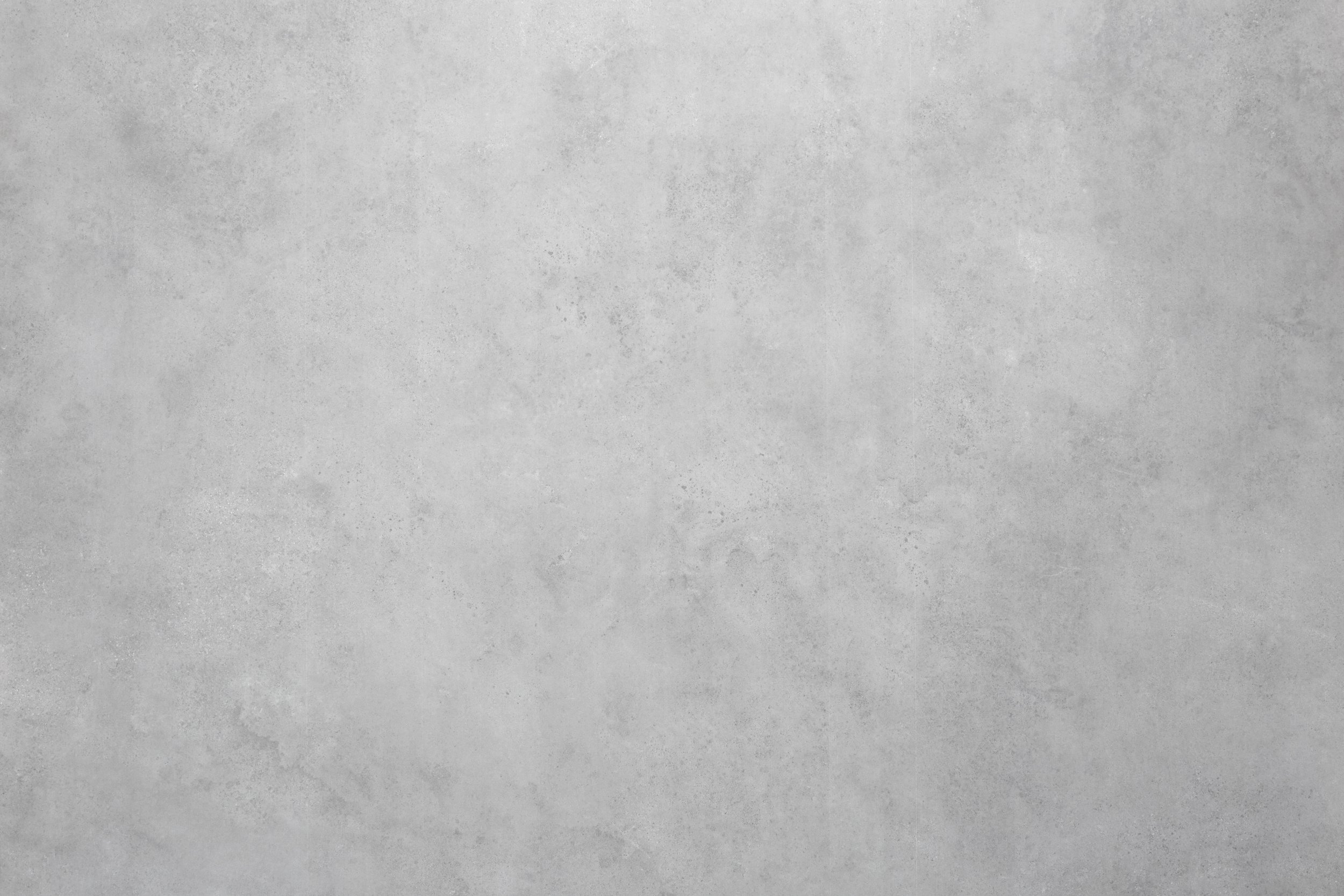 Empty concrete wall with a textured surface.