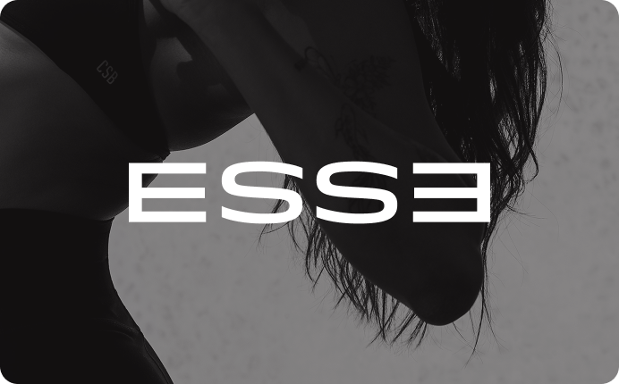 A person doing pilates, with the 'ESSE' logo overlaid in white
