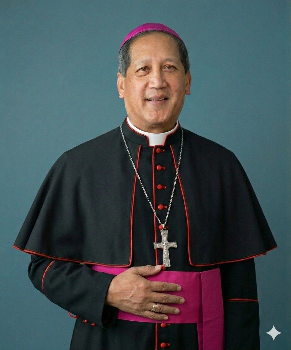 Portrait of a man wearing a magenta clerical shirt and a pectoral cross on a green and gold cord.
