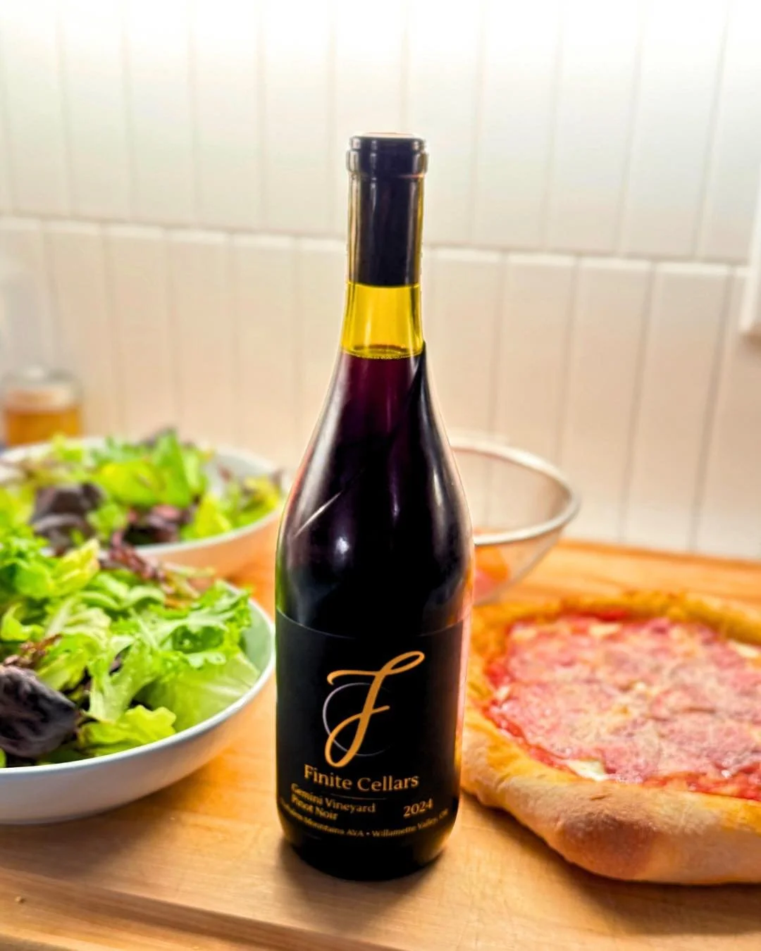 Happy #finitefriday (let&rsquo;s make that a thing!) Now that Finite Cellars is out in the wild, we&rsquo;d love to see how you&rsquo;re enjoying your first bottles! 

Ben loves making pizza from scratch for family and friends.  We enjoyed our pizza 