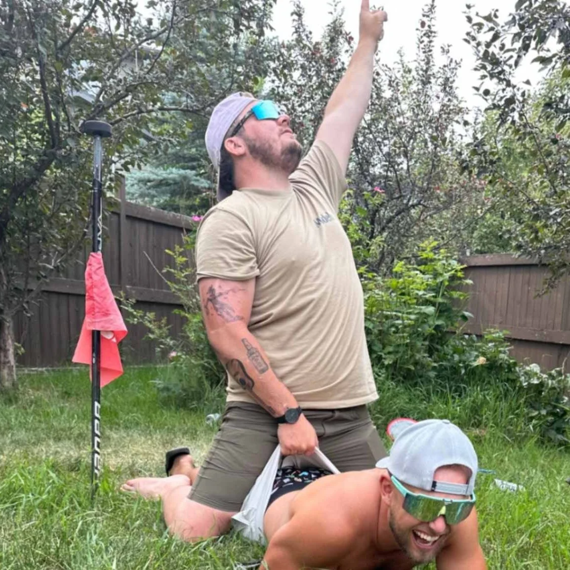 guy gives a friend a wedgie while wearing papis