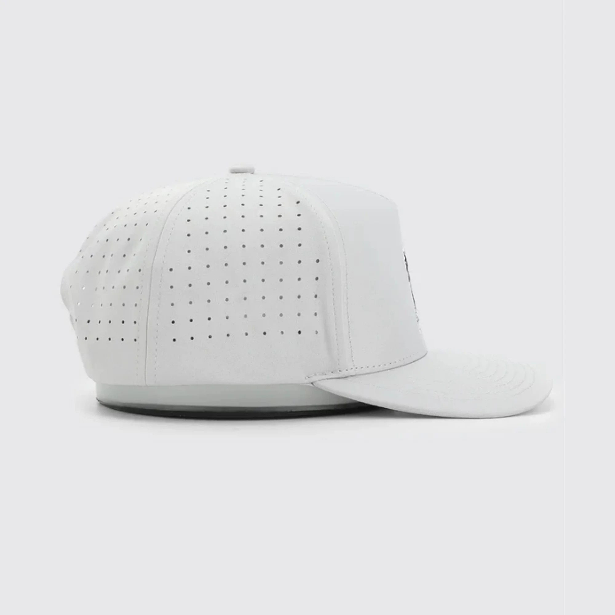 Waggle - Stinkin' It Up hat, left side view showing perforated panel detail