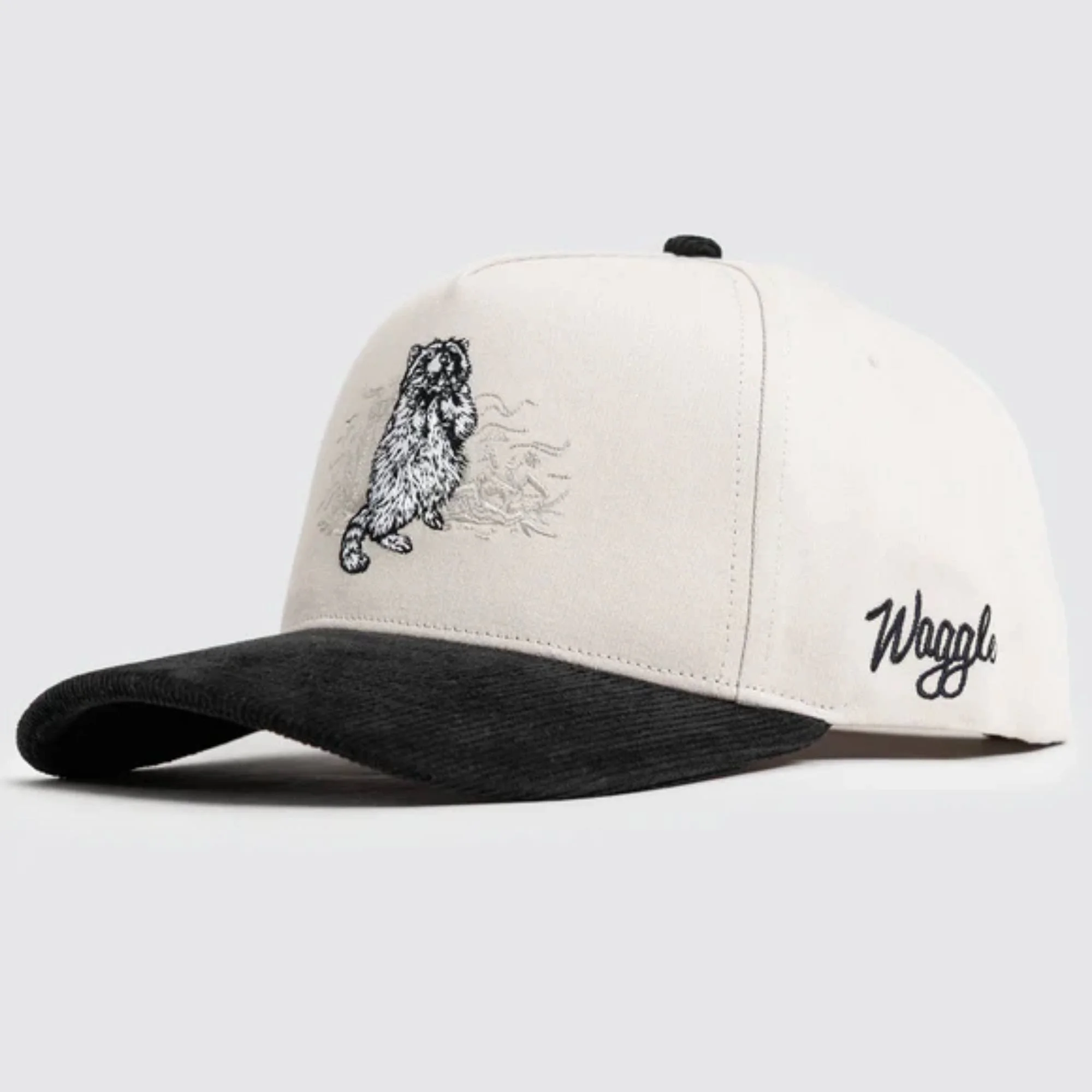 Waggle Trash Bandit Corduroy Brim hat, angled front view showing raccoon embroidery detail