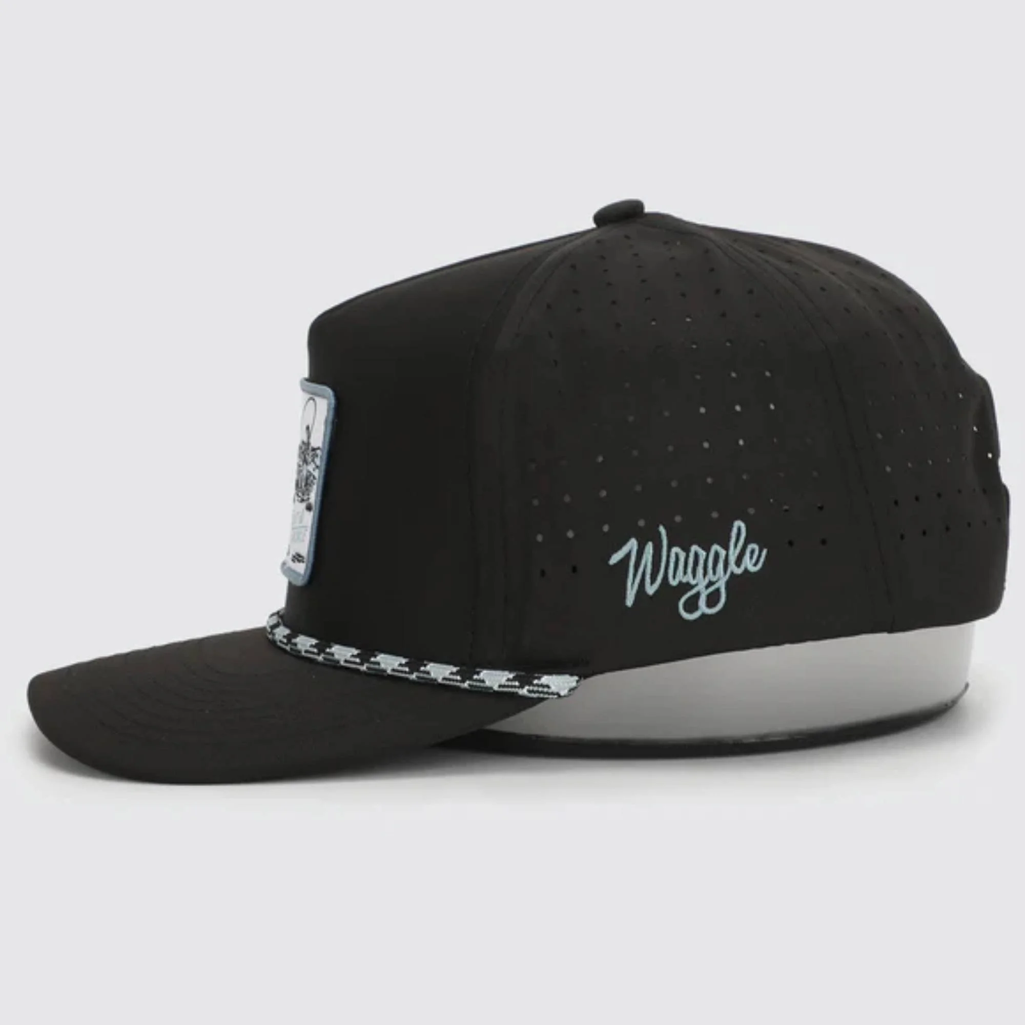 Waggle Bait & Tackle golf hat side view in black showing Waggle logo and perforated panels