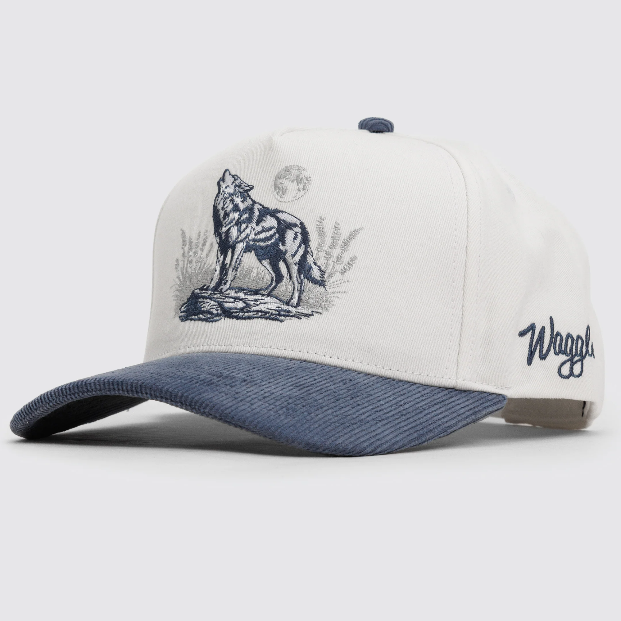 Waggle Alpha Corduroy Brim hat, angled front view showing Waggle logo on side panel