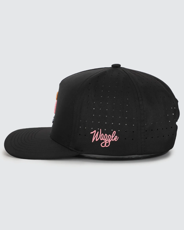 Waggle Flamingo Bay hat, side view showing Waggle logo on speckled panel