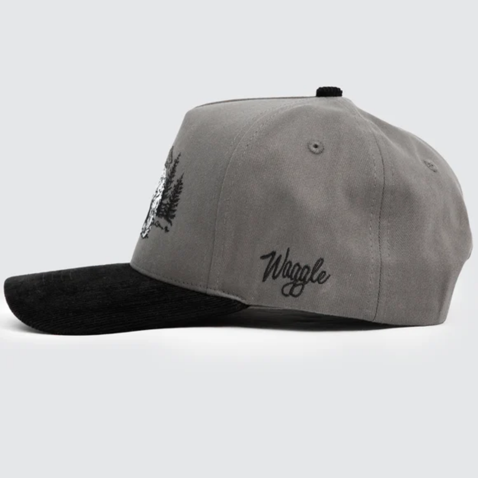 Waggle Grizz Corduroy Brim Hat, side view, grey with black corduroy brim and Waggle embroidery